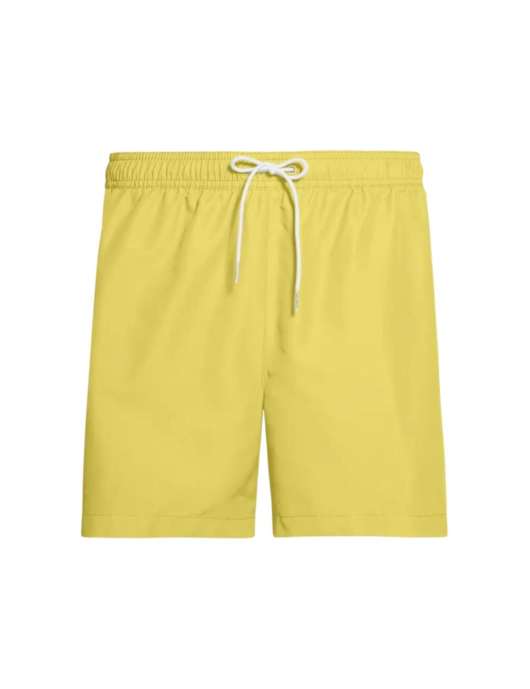The Core Logo collection combines Calvin Klein logo onto classic swimwear styles. These men's drawstring trunks are the ultimate designer swimwear must have. The medium length with a mid-rise waist offer a timeless shape and the Calvin Klein logo tape on the side seams add a subtle designer detail. A regular fit allows for all-day comfort and adjustable drawstring allows for an individual fit.  Signature Calvin Klein tape side seam Premium recycled material Comfortable regular fit Medium length Mid-rise waist Adjustable drawstring Composition: 100% Recycled Polyester Listed in UK sizes  50155-90820-1200552 KM0KM00434 Men's Swim Trunks