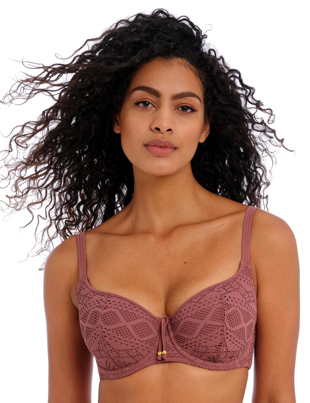 Feel the ocean breeze in this stunning bikini top, a hallmark in the Sundance range by Freya. Featuring underwiring and lightly padded cups help give extra shape and lift to your bust, enhanced further by the flattering sweetheart neckline. Dainty feminine details include the tassel detail in the centre front of the bust which is embossed with metal beading. Complete the fit by tailoring the adjustable shoulder straps to your desired length and fastening the classic back clasp. Match this piece with one of the coordinating items also available in the Sundance collection to create your own classic set.  Sweetheart bikini top Crochet styled overlay Underwired Lightly padded Tassel detail at centre front Metal beading on front detail Adjustable shoulder-length straps Classic back clasp closure Matching coordinates available Country of origin: Tunisia Composition: 88% Polyamide &pipe; 12% Elastane Listed in UK size  59887-104674-1371602 3970 Sweetheart Bikini Top