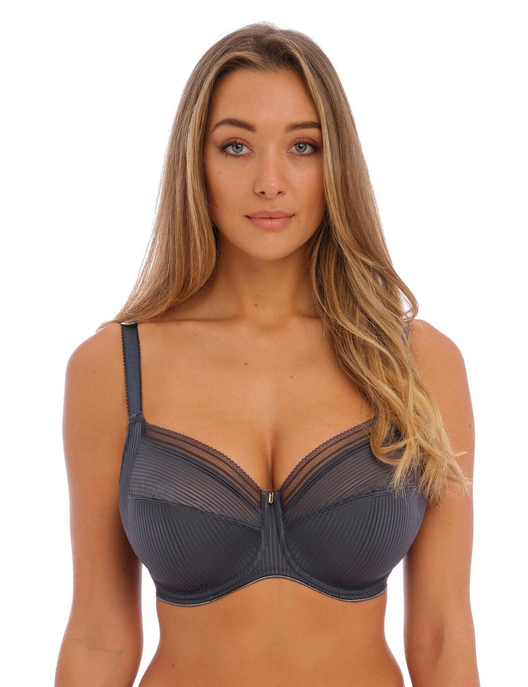 Say hello to elegant comfort and support in the Fantasie Fusion underwired full cup bra. Crafted with a unique pinstripe pattern, this underwire bra is perfect for those who seek a fashionable everyday look. The full-cup design provides complete coverage while the side support slings ensure your bust is supported all day long. The sheer panels on the top cups offer an eye-catching detail with an added touch of glamour. Plus, the non-padded design ensures lasting comfort throughout wear and adds lightness to this elegant piece of lingerie. To create a tailored fit, it features fully adjustable shoulder straps and a hook and eye back closure. Add any of the matching Fusion lingerie pieces available and you’ll be sure to have an ensemble that looks put together from start to finish.  Full-cup design Side support slings Sheer panels on the top cups Fabric with a pinstripe pattern Non-padded Underwired Hook and eye back closure Fully adjustable shoulder straps Country of origin: Tunisia Composition: 56% Polyamide &pipe; 23% Elastane &pipe; 21% Polyester Listed in UK sizes  59936-104725-1375856 3091 Full Cup Bra