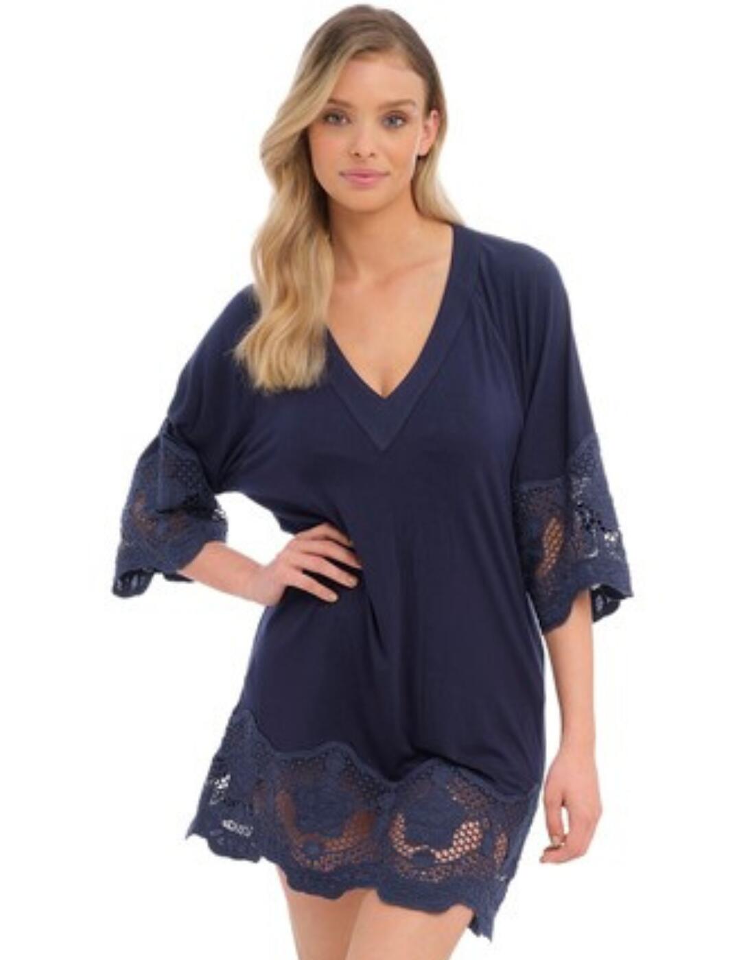 Introducing the Fantasie Dione tunic - a luxurious swim cover-up that's perfect for any occasion. With this easy throw-on piece, you don't have to waste time trying to figure out what to put on! Just pull it on, and you're ready to go. The soft lightweight fabric ensures maximum comfort and is designed with a deep v-neckline and 3/4 sleeves for the most flattering look. It also sits at mid-thigh length for coverage without sacrificing style. Its guipure embroidery edging adds a touch of feminine elegance so you can stand out from the crowd. So when you want to take your swimwear look up a notch, pair it with Fantasie's swimwear and get ready to make an unforgettable statement!  Luxurious tunic Easy throw-on piece Soft lightweight fabric Deep v neckline 3/4 Sleeves Mid-thigh length Comfortable fit Guipure embroidery edging for a feminine touch Country of origin: China Composition: 94% Viscose &pipe; 6% Elastane Listed in UK sizes  60005-104799-1377515 6364 Tunic