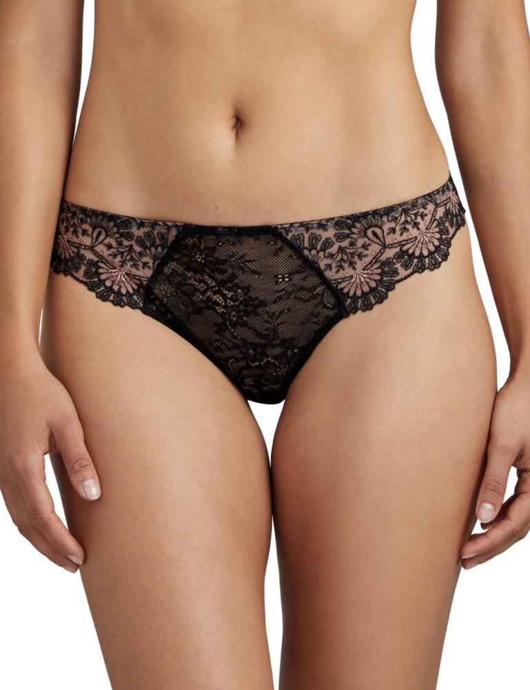 Wanting a brief that is seductive without comprising on elegance? This Tanga from the Art of Ink collection at Aubade is just the one. It sits on your hips gracefully, with a high leg cut for elongation of your legs. The front panel is a feminine lace that offers you modesty. The sides are a sheer fabric adorned with stunning intricate embroidery which really gives a luxurious feel. The rear offers a cheeky view with a thong cut, finished with the added luxury of a sparkling jewel at the waistband.  Seductive and luxurious design High leg cut Modest front panel Low rise waist Sheer sides covered with embroidery details Minimal rear coverage Jewel detail at rear Composition: 64% Polyester &pipe; 25% Polyamide &pipe; 11% Elastane Listed in UK sizes  50403-91249-1206340 TD26 Tanga Brief