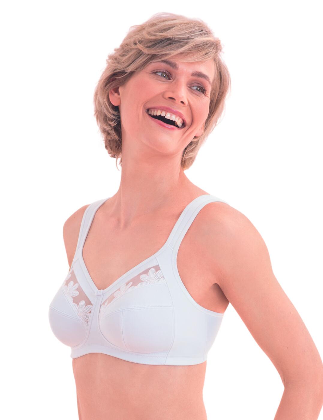 The Sophia collection by Anita combines specialised post-mastectomy bra designs with feminine floral embroidery and flirty semi-sheer tulles. This post-mastectomy bilateral bra offers a comfortable stretch panelled design along the neckline and under the arms. The bilateral design offers pockets on both sides for added prosthesis and the cups are made from a soft firm fabric for a naturally rounded shape. Wear with matching lingerie from the Sophia collection for a beautiful coordinated look.  Specialised post-mastectomy design Flirty semi-sheer detail Feminine floral embroidery Bilateral and pockets on both sides design Non-wired Adjustable padded straps Soft moulded cups Prosthesis not included Country of origin: Thailand Composition: 70% Nylon &pipe; 16% Elastane &pipe; 14% Cotton Listed in UK sizes  52355-94186-1233609 4709X Bilateral Post Mastectomy Bra