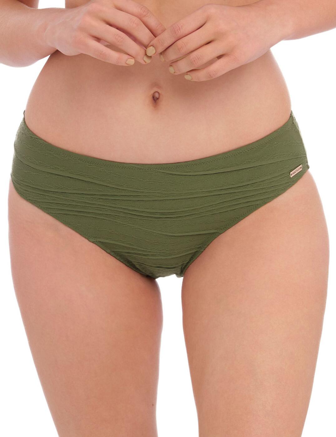 Are you looking for the perfect swimwear that'll make you look fashionable and fabulous this summer? Look no further than Fantasie's Beach Waves bikini brief! This alluring bikini brief offers classic appeal with its ruched material, mid-rise waist, and moderate rear coverage. The bottom also features the iconic Fantasie branding detail to add a subtle yet stylish effect. Plus, you have a variety of matching coordinates available so you can mix and match your way to an outfit that stands out from the rest of the beachgoers. Whether it's relaxing on a sun chair or taking a dip in the pool, this bikini brief helps you feel comfortable and confident when enjoying your sunny days!