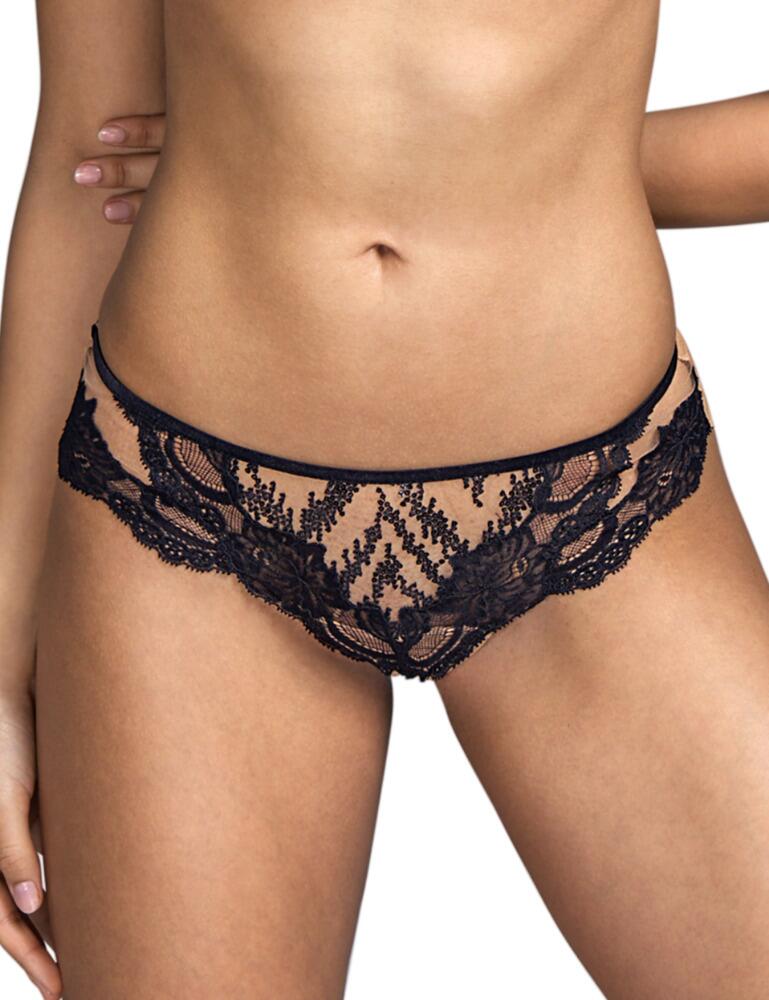 The Renata collection by Andres Sarda uses premium transparent tulle with contrasting lace detailing for a bold sexy style. This short thong has a classic minimal coverage and a cheeky low-rise design. A detailed lace front to the sultry all-over semi-sheer tulle adds a feminine finish to the flirty style. For sexy coordinated look wear with matching lingerie from the Renta line by Andres Sarda.  Luxurious sultry style Premium semi-sheer tulle Contrasting lace detail Sexy minimal coverage Low rise waist Composition: 77% Polyamide &pipe; 12% Elastane &pipe; 6% Other Fibres &pipe; 5% Cotton  Listed in UK sizes  50503-91380-1201859 3310355 Short Thong