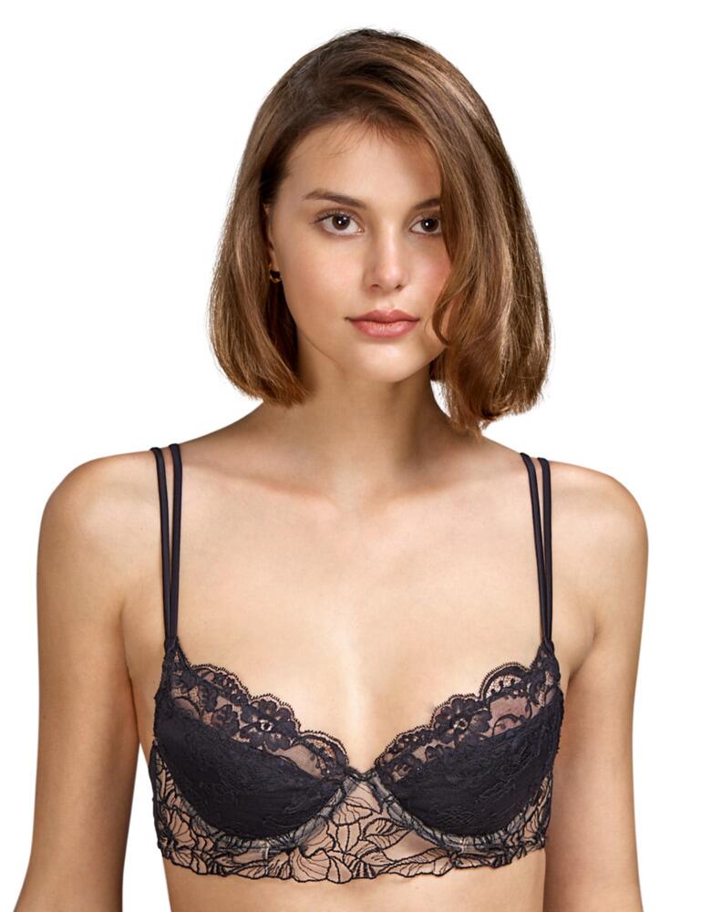 Andres Sarda combines its elegant lingerie designs and a premium sultry style in the Tamara lingerie line. This push-up bra flaunts feminine lace overlay and semi-sheer tulle for a sexy statement style. A removable padding design offers optional extra uplift to the sexy plunging neckline. The silk blend material creates the utmost luxurious feel. Underwiring offers added support and the adjustable straps create the perfect fit. Matching lingerie is available from the Tamara collection by Andres Sarda for a striking flirty look.  Seductive and sophisticated style Plunging neckline Luxurious silk-blend Premium lace detail Split spaghetti adjustable straps Underwired for support Uplifting removable padding Composition: 50% Polyester &pipe; 26% Polyamide &pipe; 22% Silk &pipe; 2% Elastane  Listed in UK sizes  50513-91390-1201872 3310417 Push Up Bra