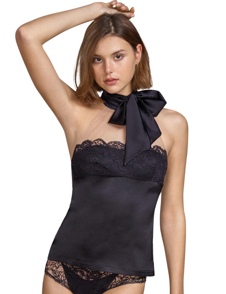 The Tamara collection combines Andres Sarda's renowned elegant style with a luxurious seductive look. This cupless top blends premium silk and sexy semi-sheer tulle fabrics for an indulgent statement piece. A bold halterneck tie allows for a sexy reveal and the lace detail adds a feminine detail. A regular fit design seductively skims the skin and offers for the utmost comfortable fit. For an ultra-sexy look, wear with matching lingerie from the Tamara lingerie line by Andres Sarda.  Elegant sultry style Statement halterneck bow detail Luxurious lace detail Sexy silk and semi-sheer tulle combination Regular fit design Non-padded Composition: 65% Silk &pipe; 28% Polyamide &pipe; 7% Elastane  Listed in UK sizes  50519-91396-1201889 3310485 Cupless Top