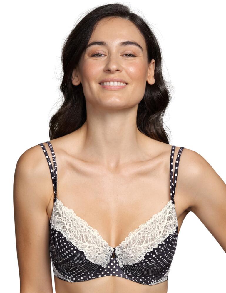 Feel incredible in this Flower full cup bra by Andres Sarda. The Flower range brings femininity and freshness with its modern dot print that differs in size in an unsymmetrical pattern. This full cup bra provides full coverage for the breasts and a light lining of transparent tulle gives support. The bra is non-padded and has an underwire that gives additional support. It features elegant lace that runs horizontally along the top of the cups. This bra also features double straps that are adjustable and gives the option to wear as a cross back. To the rear, there is a hook and eye closure allowing for an individual fit.  Full cup bra Feminine fit Modern dot design Full coverage Light lining of transparent tulle Non-padded Underwired Elegant lace detailing along top cups Double adjustable straps Option of crossed back straps Hook and eye closure Composition: 86% Polyamide &pipe; 14% Elastane  Listed in UK sizes  50532-91409-1201657 3309111 Full Cup Bra
