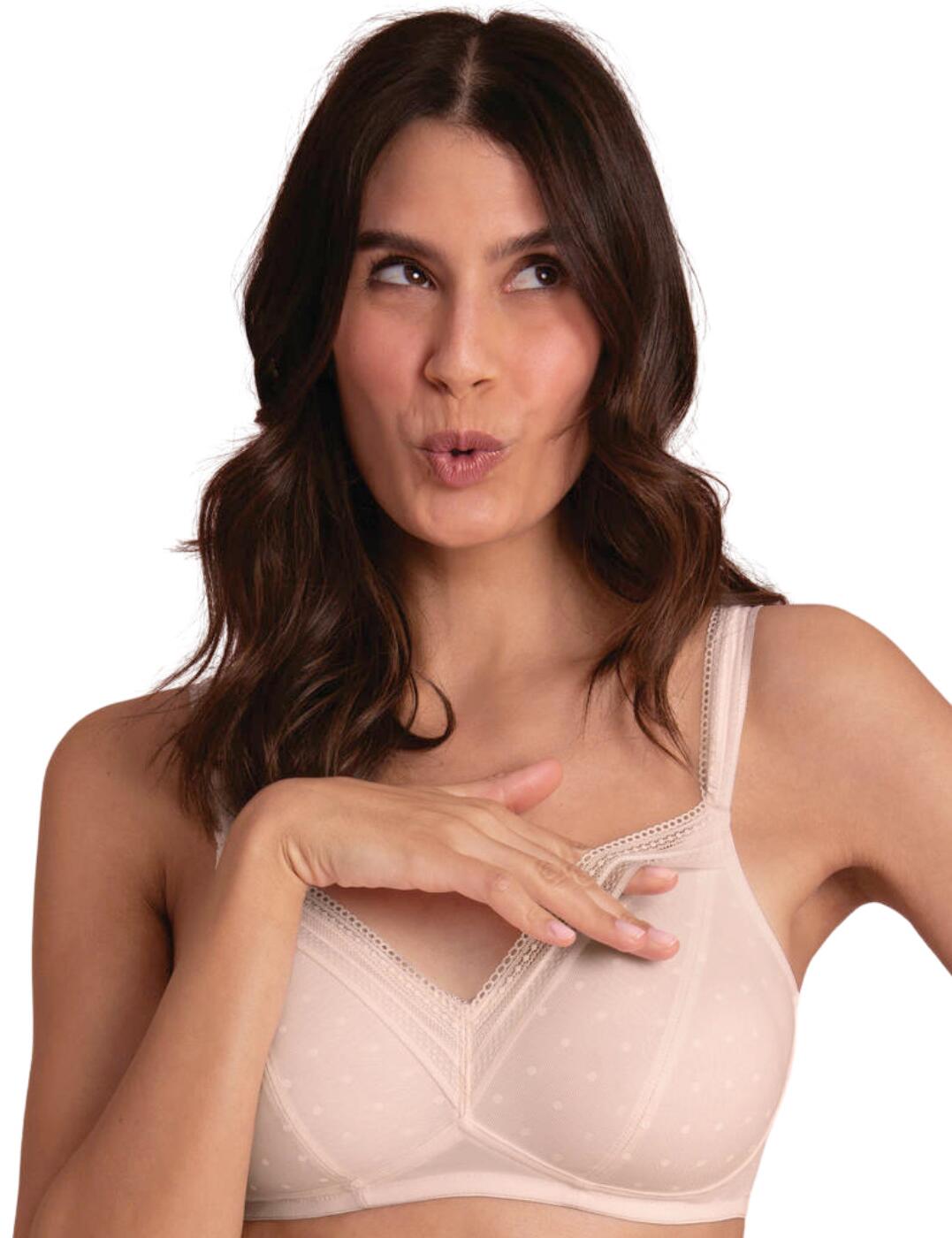 Anita Care's Emily post mastectomy bra is delicate and feminine, while still providing the support you need. This non-wired bra is lined with pockets to insert a prosthesis if required, with no padding for a natural look. The full-coverage cups are lined with elegant lace that is chic and playful. The hook and eye fastening and adjustable straps ensure the perfect fit all day long.  Non-wired Non-padded Hook and eye fastening Adjustable straps Polka dot tulle Lace neckline Full cup coverage Country of origin: Thailand Composition: 84% Polyamide &pipe;16% Elastane Listed in UK sizes  57350-101295-1312268 5798X Post Mastectomy Bra