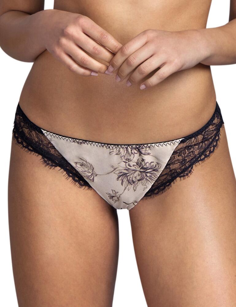 Andres Sarda's Wang collection combines premium silk with luxurious lace trims creating the finest sensual lingerie. These Rio briefs boast a contrasting silk and lace front with delicate scalloped edges which add a floral feminine detail. A moderate coverage and transparent tulle rear add to the flirty look. For a chic sexy style, wear with matching lingerie from the Wange range by Andres Sarda.  Elegant sultry style Premium silk-blend Sexy transparent tulle Feminine lace detail Medium rise waist Delicate scalloped edges Moderate cheeky rear coverage Composition: 54% Polyamide &pipe; 17% Cotton &pipe; 17% Silk &pipe; 12% Elastane Listed in UK sizes  50552-91456-1204864 3310050 Rio Briefs