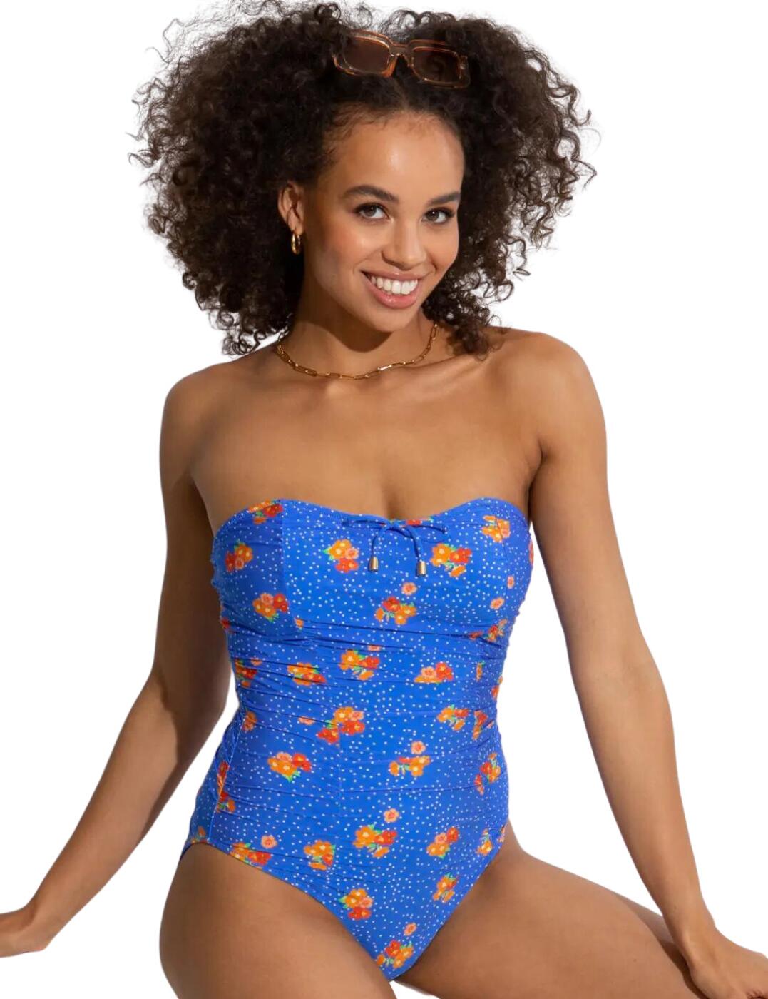 Introducing the Pour Moi Santa Cruz strapless swimsuit! If you're looking for an elegant swimsuit that compliments your figure, this is the one for you. Its alluring floral print is sure to stand out in any outdoor setting, while its wireless construction and non-padded cups provide extra comfort. The Santa Cruz also features tummy control and moderate rear coverage. Take a look at other pieces from this stunning range for a beautiful swimwear look.