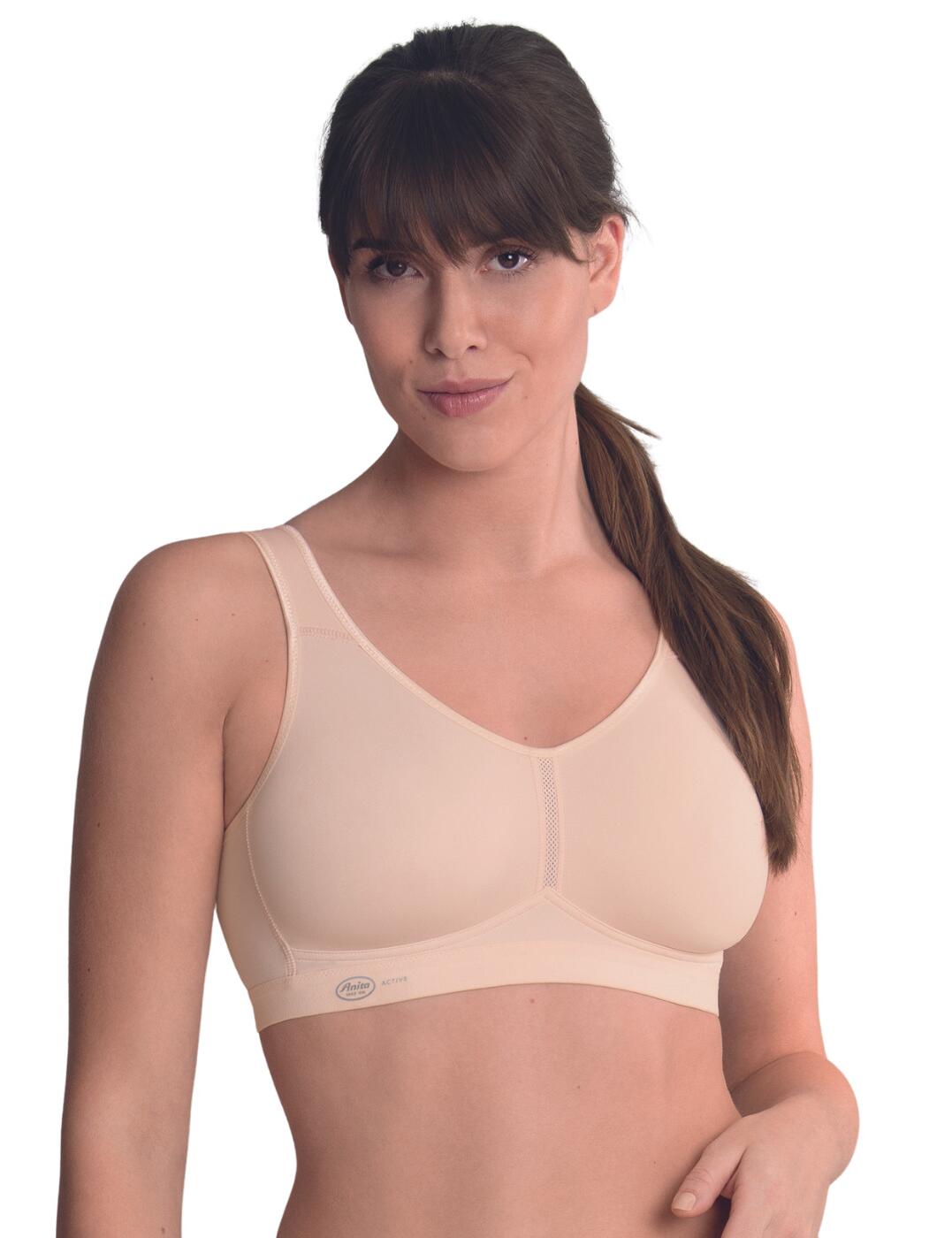 With cute Anita Active branding in the bottom right, this sporty bra from the Light & Firm series has been crafted into shape from highly functional microfibre which makes these cups incredibly comfortable and lightweight, perfect for an active lifestyle. Also being made with breathable net fabric creates a dry feeling around your breasts allowing sweat to secretly escape the outside of the bra. Although this piece is named as a sports bra this could easily be used as an everyday comfort bra. The strongly shaped cups allow a superior fit for all breast shapes which will keep your bust firm and in place, throughout any activity, you're diving into, or if you are just chilling on the sofa before you head out for the day. Great for any occasion, get yourself this extremely lightweight, breathable wireless bra, you won't regret it!  Anita Active sports bra From the Light and Firm range Hook and eye closure for the securest fit Full cup coverage Wireless Shaped cups made from microfibre Perfect for all breast shapes Crafted with breathable net fabric Perfect for both an active and non-active lifestyle Open netting down the centre for a cooling effect Super-lightweight and non-restricting, allowing movement with ease Country of origin: Myanmar Composition: 80% Nylon &pipe; 20% Elastane Listed in UK sizes  57463-101477-1315514 5521 Sports Bra