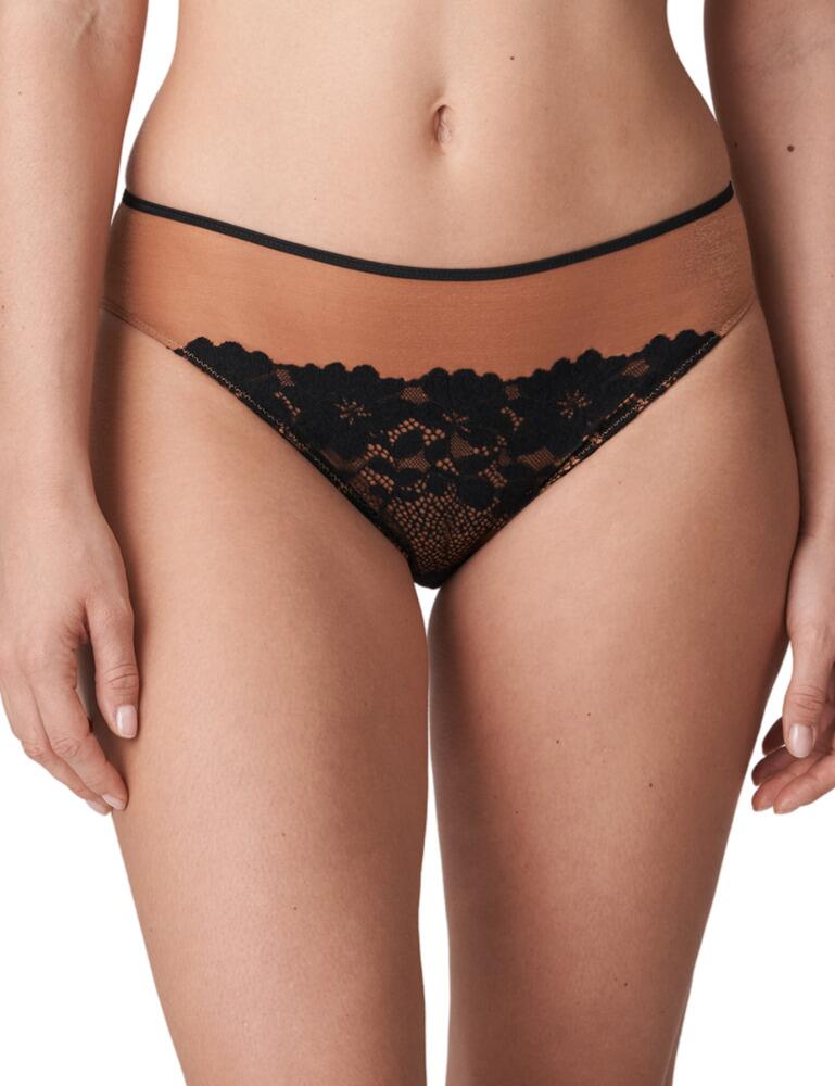 Feel amazing in these Abbey Road Rio briefs by Prima Donna Twist. These Rio briefs are crafted from a satiny fabric which gives the look and feel of tights. From the Abbey Road range, it provides a gorgeous velvet flower lace design that sits along the front of the bottom half of the brief. The rear features a plain and opaque fabric with triangle lace cut-outs at the waistband. This brief offers full rear coverage.  Rio briefs Crafted from satiny fabric Gorgeous velvet flower lace detailing Plain opaque fabric to the rear Full rear coverage Composition: 76% Polyamide &pipe; 16% Elastane &pipe; 8% Cotton Listed in UK sizes  50598-91511-1204030 0541950 Rio Brief