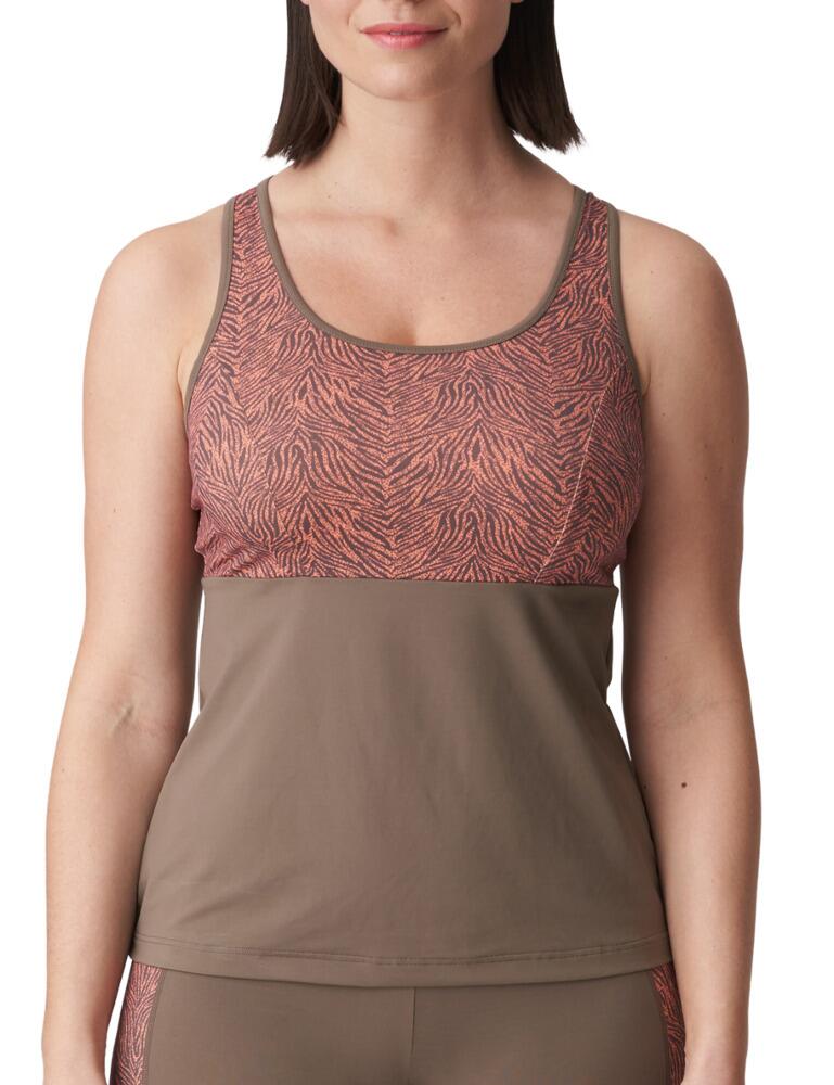 This Prima Donna Sport tank top from the Dromeas range is the perfect top to wear when you work out. Made from light airy fabric, this top is going to help keep you cool when working out. The opaque fabric ensures you stay covered up when working out, and won't become transparent when you start working out. The two tone top is very stylish, and will make you look fabulous when hitting the gym. The thick straps definitely won't fall down when working out. The back of the top is detailed with a criss-cross design, making it extra stylish.  Opaque Fabric Criss-Cross Back Light Airy Fabric Tank Top Pull-On Design Thick, Adjustable Straps Composition: 80% Polyamide &pipe; 20% Elastane Listed In UK Sizes  50675-91598-1205382 6000681 Sports Top
