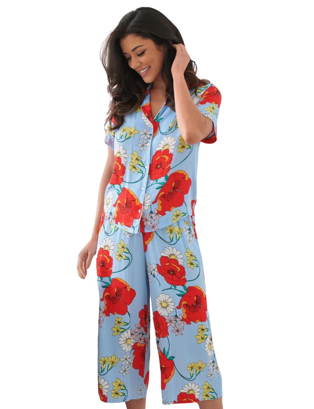 Pour Moi's Luxxe Woven pyjama set is playful and fresh with the short sleeves and cropped legs feeling lightweight and free. The collared top is sophisticated and classy with the traditional button-up fastening on the front. The pants are wide-leg and non-cuffed for a flowy feel and feature an elasticated waist to ensure that they stay snug and secure no matter what. Embody the utmost comfort with this gorgeous pyjama set that is sure to add some excitement to your evening.  Top: Collared design Short sleeves Button up fastening Pants: Cropped length Non-cuffed Elasticated waist Country of origin: China Composition: 100% Viscose Listed in UK sizes  57721-101792-1323080 23120 Pyjama Set