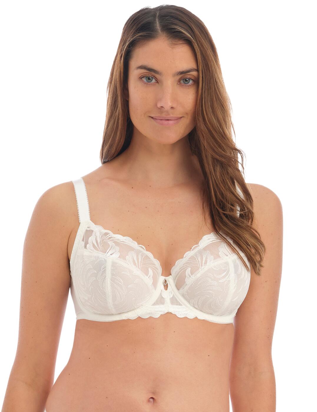 This beautiful side support bra from the Anoushka range by Fantasie is the ultimate must-have for any lingerie drawer. Stunning floral embroidery runs over the full cups creating a very feminine appearance. The top part of the cup is completely transparent allowing the skin to easily show through this generates a very alluring vibe. Scalloped edging dances around the neckline, making it so the design seems to flow over the edge into the chest. Leading onto the back you'll find a mesh rear panel that has been made wider for a more supportive fit along with the sides which also prevents spillages and leaves your busts feeling firm and well-held. A classic hook and eye closure at the rear and adjustable shoulder straps allow for adjustability creating a unique fit. Being underwired also creates a sense of a very secure design.  Side support bra Underwired for a more secure fit Wide side and rear panels Full cup coverage Hook and eye closure Floral lace embroidery, semi-sheer style Everyday wear with a sexy look Hook and eye closure Country of origin: Sri Lanka Composition: 50% Polyamide &pipe; 39% Polyester &pipe; 11% Elastane Listed in UK sizes  57827-101947-1323487 3212 Full Cup Bra