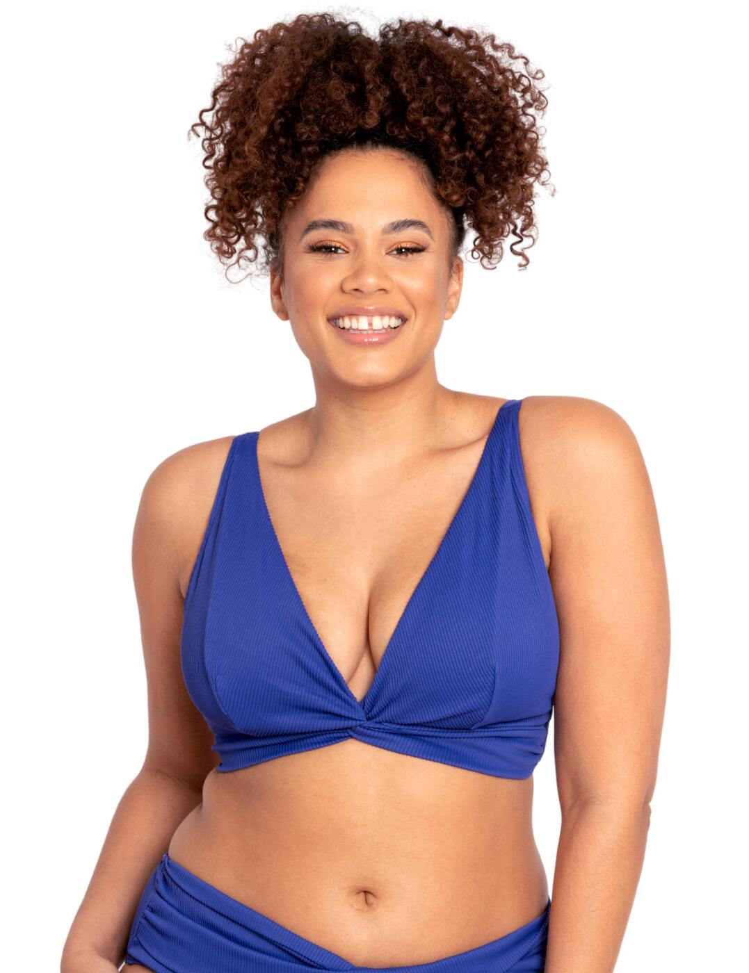 A classic triangle bikini top that is both stylish and comfortable is precisely what the Twist & Shout collection from Curvy Kare represents. The deep plunging neckline with triangle cups is a true eye-catcher, and with the cheeky twist detailing in the centre, it is sure to accentuate your curves in the most flattering way. The comfortable elastic material is lightly lined on the cups providing extra support to the non-wired design. The adjustable shoulder straps can be worn in multiple ways giving you additional stylish detail to this classic design.  Deep plunging neckline with triangle cups Ribbed elastic material Adjustable multiway shoulder straps Swimwear clicker back closure Non-wired Lightly lined cups Wear with matching coordinates Country of origin: China Listed in UK sizes  53977-96661-1259748 CS024308 Plunge Bikini Top