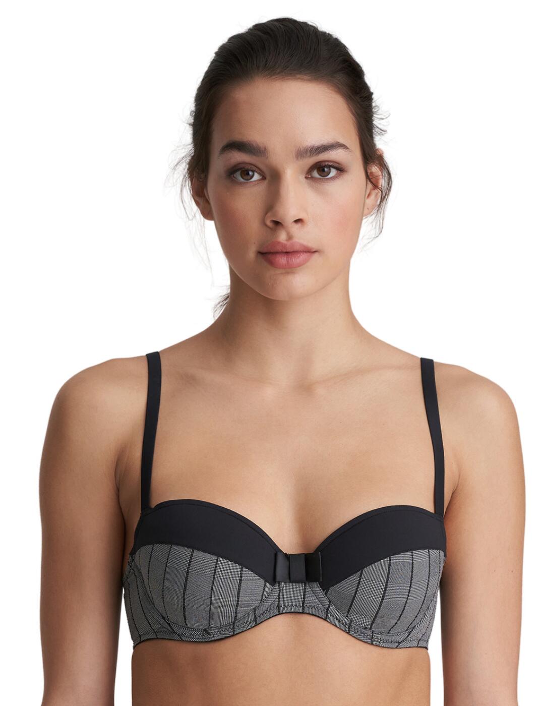Sophisticated and chic, this Robert balcony bra from Marie Jo is a trendy wear under all your outfits. The cups are underwired in a balcony shape with padding to give a nicely enhanced shape. The bottom cup is a checked fabric for a sleek look, whilst the contrasting top cup offers a large bow detail at the centre. The straps and back are slim for a delicate, lightweight wear.  Trendy and elegant design Underwired Checked fabric Contrasting top cup with bow detail Balcony cups Padded cups Small hook and eye closure Adjustable straps Composition: 55% Polyester &pipe; 35% Polyamide &pipe; 10% Elastane Listed in UK sizes  50727-91663-1206013 0122109  Balcony Bra