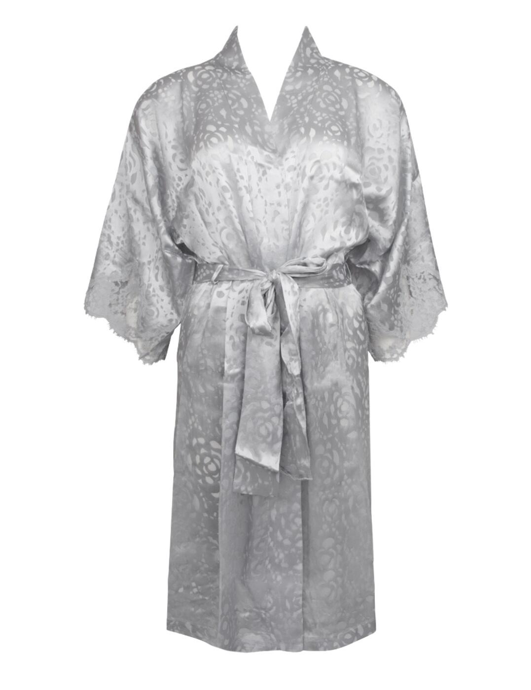 The Dressing Floral collection by Lise Charmel flaunts the utmost luxurious fabric with a 'burnt-out' design which seductively shows the semi-sheer tulle beneath. This timeless robe has a classic self-tie design that creates a feminine silhouette and allows you to reveal as much cleavage as you feel comfortable! The short sleeves boast a premium lace trim for a feminine finish. For a sexy coordinated look, wear with sensual matching nightwear from the Dressing Floral collection by Lise Charmel.  Classic chic design Luxurious seductive fabric Feminine lace detail Short length Adjustable tie belt Short sleeves Country of origin: China Composition: 66% Viscose &pipe; 16% Polyamide &pipe; 14% Silk &pipe; 4% Cotton Listed in UK sizes  56653-100429-1302105 ALC2088 Robe