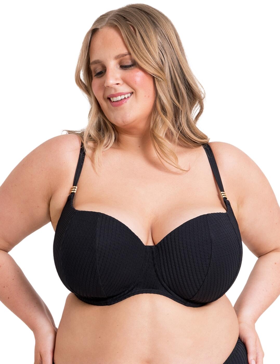 Get ready to make a splash this season with the Curvy Kate Jet Set balcony bikini top. The balcony style of this bikini top provides full coverage, ensuring you feel secure and confident as you soak up the sun. But don't let the coverage fool you, the twisted ribbed texture adds a playful and flirty touch to this classic style. An underwired, padded design provides lift and shape, making you feel and look your best. Meanwhile, gold hardware adds a touch of luxury and sophistication, making you feel like a jet-setting fashionista wherever you go. With adjustable shoulder straps and a classic back clasp, you can customize the fit to your body for maximum comfort. But don't stop at just the top, complete your glamorous beach look with the coordinating pieces available to match.
