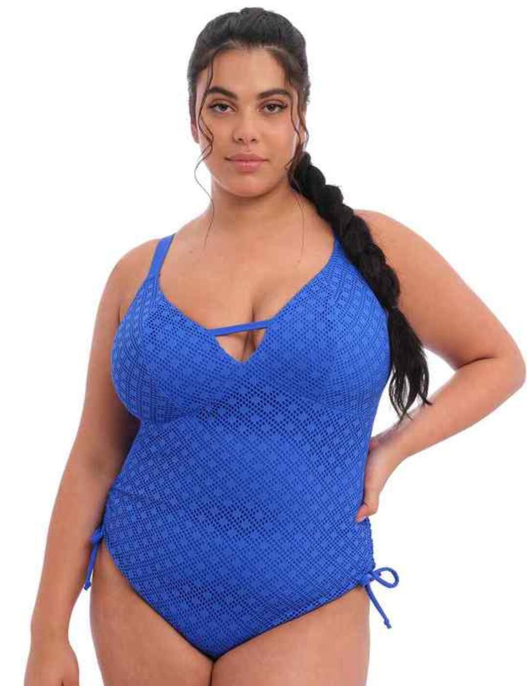 Elomi brings pieces that help showcase your outer body whilst helping you feel your inner beauty, ensuring you feel confident and feminine all day long. The Bazaruto range by Elomi introduces this non-wired swimsuit which has a flattering neckline with non-moulded cups and a plunging neckline that highlights your cleavage. It has adjustable straps and a clasp closure along with a powernet panel under the cups which is attracted to the elasticated under band for a supportive fit. The swimsuit is covered in an opaque crochet fabric with a strappy detail across the bust and adjustable ties at the side which allows you to create your ideal amount of coverage.