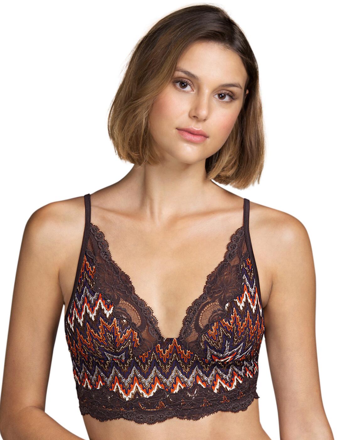 The Jackson soft wireless bra by Andres Sarda is perfect for daily wear. The plunging cups make this bra easy to conceal under even low-cut clothing and highlights your cleavage. Soft scalloped hems contour to the body for a flattering and comfortable fit. The feminine longline design flatters the midsection. High apex wings create a smoother silhouette while a low back allows you to wear with low-back tops. The wireless design offers a natural look and feel. Adjustable shoulder straps allow you to control the fit. Pair with matching briefs for a coordinated look.  Glamorous metallic finish Flirty lace neckline Plunging cups Wireless Longline style Adjustable shoulder straps Country of origin: Tunisia Composition: 49% Polyamide &pipe; 43% Polyester &pipe; 7% Elastane &pipe; 1% Metal fibre  Listed in UK sizes  54683-97512-1265008 3310719  Bralette