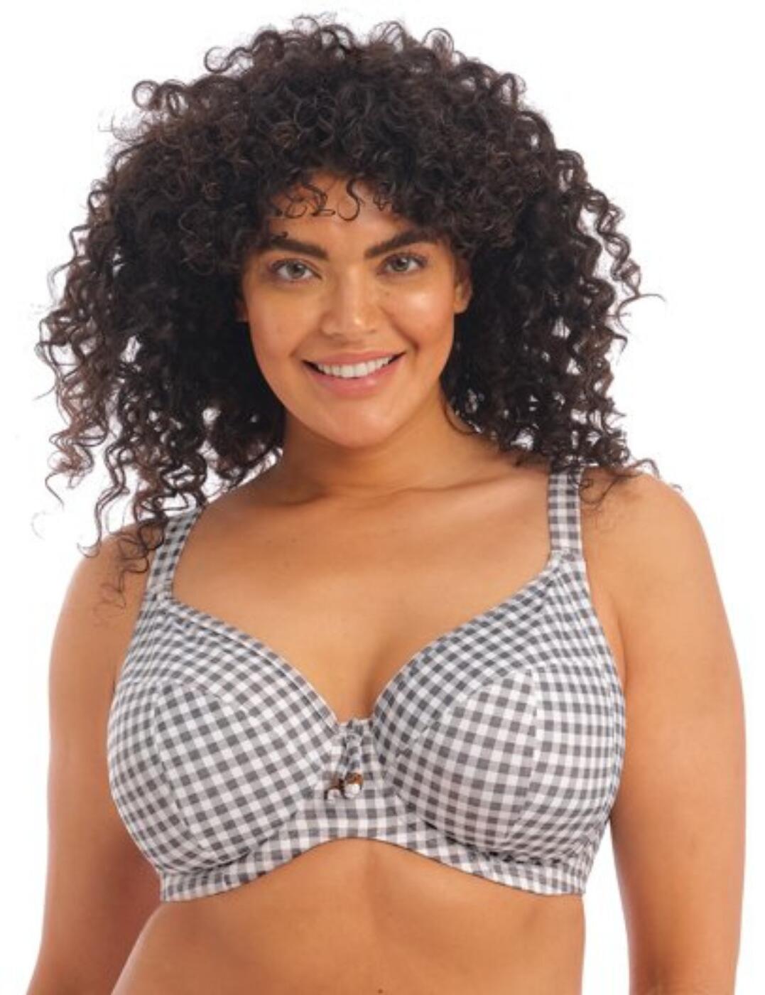 Refresh your swimwear collection with the Checkmate range from Elomi, it brings a trendy gingham pattern with the much-loved Elomi fit. This plunge bikini top provides full coverage with fully lined cups and supportive underwiring. The adjustable straps are multi-way and can be worn as normal straps or cross back allowing for a unique fit along with the clasp closure at the back. Made complete with a little tie detail in the centre of the bra with tortoiseshell beads at the bottom. Matching items are also available for a fully coordinated look.  Plunge bikini top Full coverage fully lined cups Underwired for support Multi-way adjustable straps Clasp closure Trendy gingham print Little centre tie detail with tortoiseshell beads Matching items are also available Country of origin: Indonesia Composition: 84% Nylon/ Polyamide &pipe; 16% Elastane Listed in UK sizes  57929-102103-1325739 800302  Plunge Bikini Top