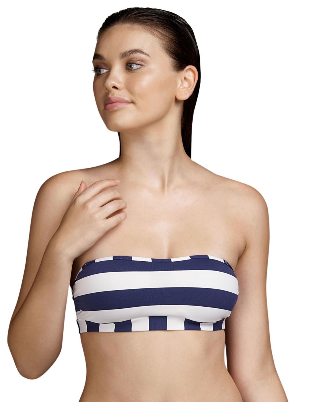 Swim into this season with Andres Sarda's Curie collection! This chic and marine-inspired strapless padded bikini top offers a timeless yet on-trend look for any beachgoer this season. Features a striped nautical print that would look gorgeous on your curves this season. This bikini top is wireless for maximum comfort whilst also offering padding to shape and mould your bust to ensure confidence and seduction all summer long. Can be worn with or without straps depending on your mood and what vibe you desire this season. Matching coordinates are available to complete this sexy look.  Can be worn with or without straps Padded cups to shape and support your bust Gorgeous nautical-inspired striped print Secured at the back with a clasp fastening Bandeau design, sexy and classy all in one Wireless design for comfort Country of origin: Tunisia Composition: 54% Polyamide &pipe; 41% Polyester &pipe; 5% Elastane  Listed in UK sizes  54699-97544-1265139 3410518 Strapless Padded Bikini Top