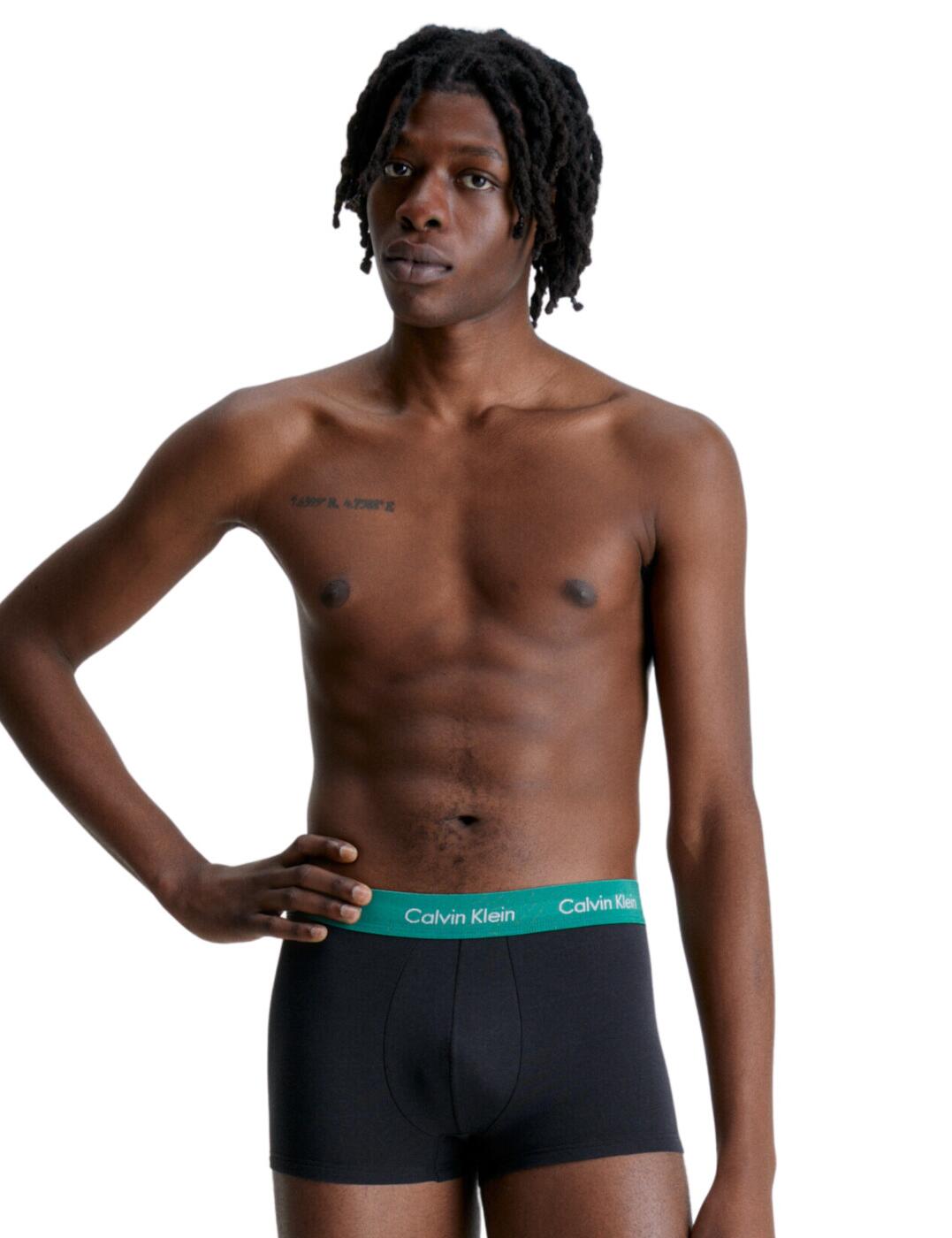 Experience a superior fit with Calvin Klein's Cotton Stretch 3 Pack of briefs. Crafted from a soft-yet-durable cotton elastane blend, these low-rise waist briefs provide the perfect balance of comfort and style. The signature elastic waistband on each pair is designed to move with you, making them ideal for everyday wear. Whether you're lazing around the house or running errands outside, these Cotton Stretch briefs will keep you comfortable all day long. For men who want trendy underwear that won't let them down, this 3 Pack of briefs from Calvin Klein is sure to offer the ideal blend of casual sophistication and reliable practicality.  Handy 3 pack Low rise waist Cotton blend Calvin Klein logo detailing Soft and breathable Country of origin: Bangladesh Composition: 95% Cotton &pipe; 5% Elastane Listed in UK sizes  60735-105676-1403546 0000U2664G Men's Brief  ACTUAL COLOUR NAME:B-chrcl hthr, mrngsd yw, flg grn wb (CA9)