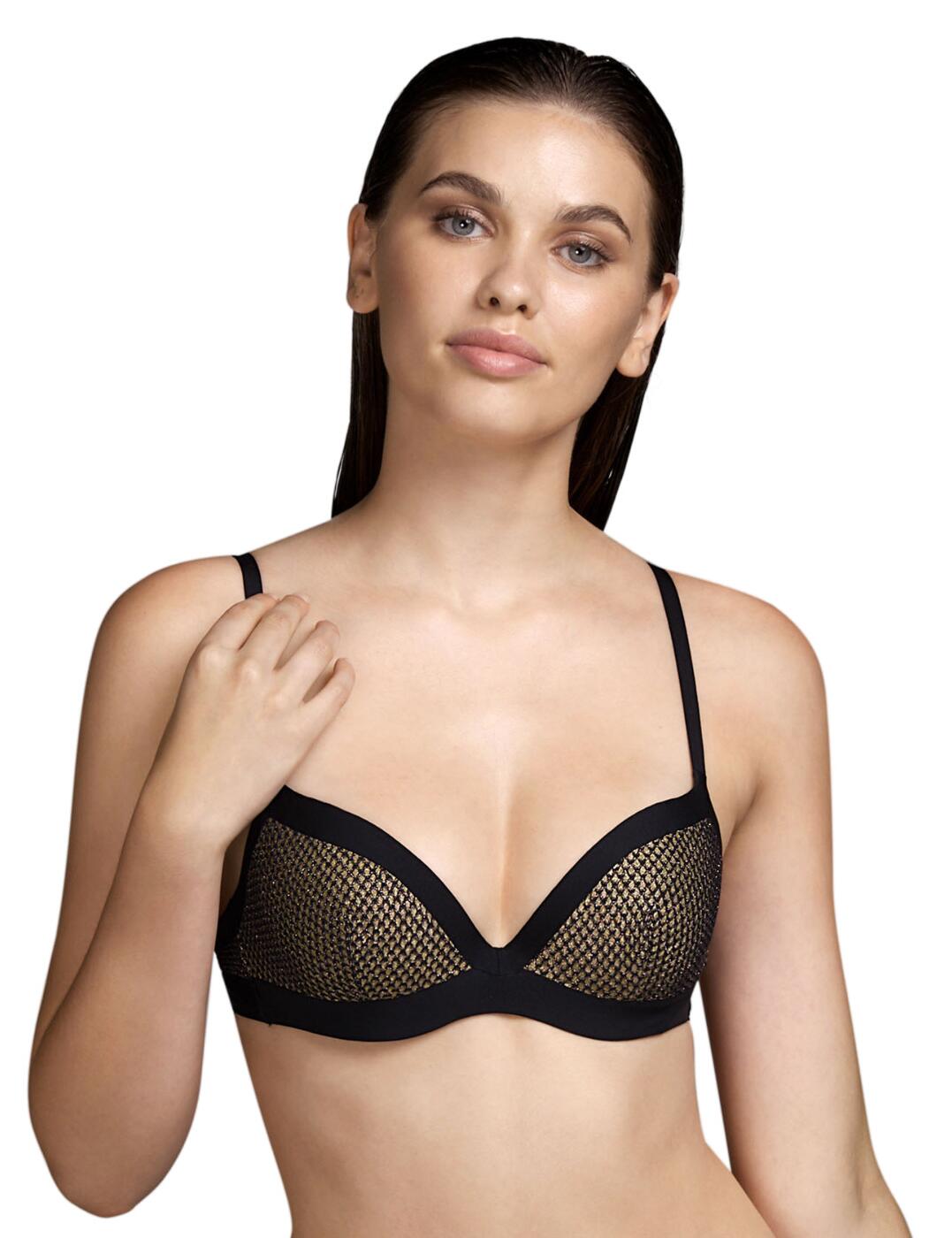 The classic elegance of this Baker bikini top from Andres Sarda will make you breathless. The deep plunging neckline will bring attention to your beautiful curves, while the full-cup coverage will make sure that you are comfortable throughout your beach activities. The classic cut is made that much more interesting with the contrasting material on the cups, accentuated by a netted pattern. The back features golden metallic details with a swimwear clip fastening. The whole design creates an incredibly luxurious feel and an elegant look.  Deep plunging neckline Full-cup design Adjustable shoulder straps Swimwear clip back fastening Underwired Padded Matching coordinates available Care: Hand wash Country of origin: Tunisia Composition: 53% Polyamide &pipe; 37% Polyester &pipe; 9% Elastane &pipe; 1% Metal fibre Listed in UK sizes  54736-97608-1266177 3410816 Padded Full Cup Bikini Top