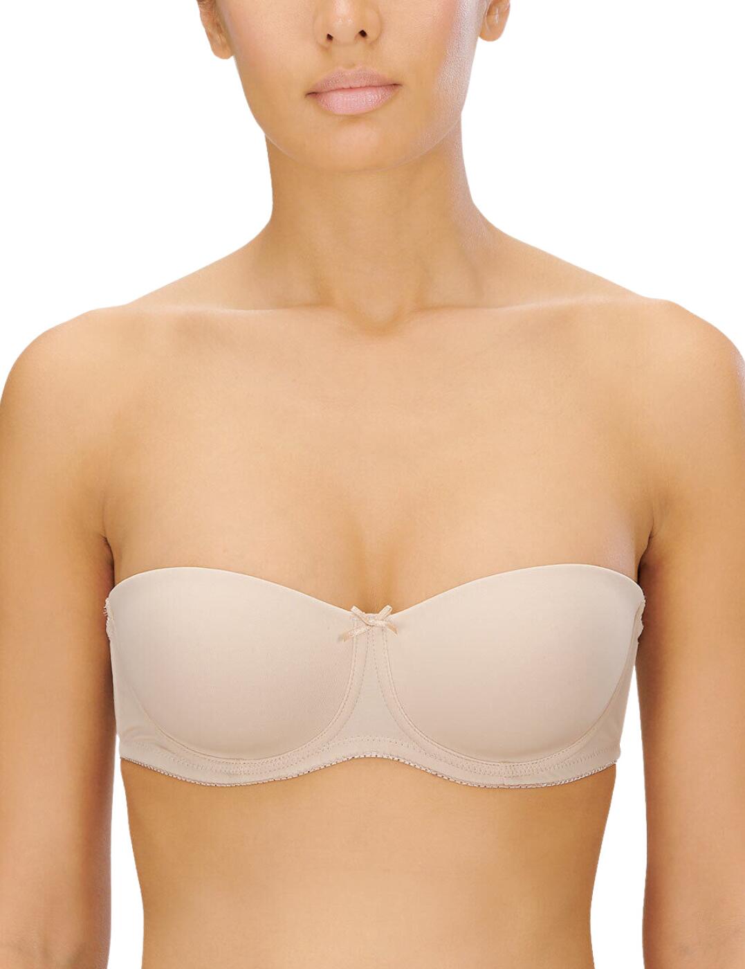 Naturana's strapless bra is fashion-forward and chic, with adjustable straps to ensure you get the perfect fit, that you can remove to add versatility and comfort. There is an underwire for support and the padded cups give you a lift for a sensual, smooth silhouette. The cute bow embellishment in the centre adds a playful touch and the hook and eye fastening means this bra will stay in place with or without straps.  Removable adjustable straps Underwired Uplifting padded cups Balcony neckline Bow embellishment Country of origin: China Composition: 82% Polyamide &pipe; 18% Elastane Listed in UK sizes  57986-102179-1333877 7633 Strapless Bra