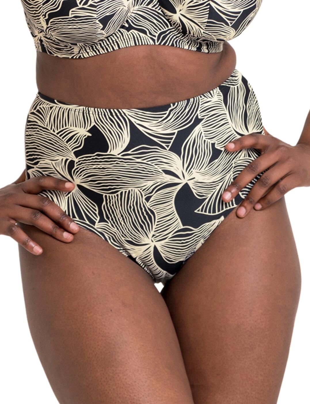 Introducing the Curvy Kate Ripple Reef full bikini brief - the perfect addition to your swimwear collection this season! The high-rise waist offers a flattering and comfortable fit, while the wide side panels give you the coverage you need without sacrificing style. A graphic leaf print adds a touch of tropical flair, making you stand out amongst the sea of basic swimwear. But don't just take our word for it, the full rear coverage ensures that you will feel confident and covered, no matter your body shape. And for those who like to mix and match, the matching coordinates allow you to create your own unique and fashion-forward look.