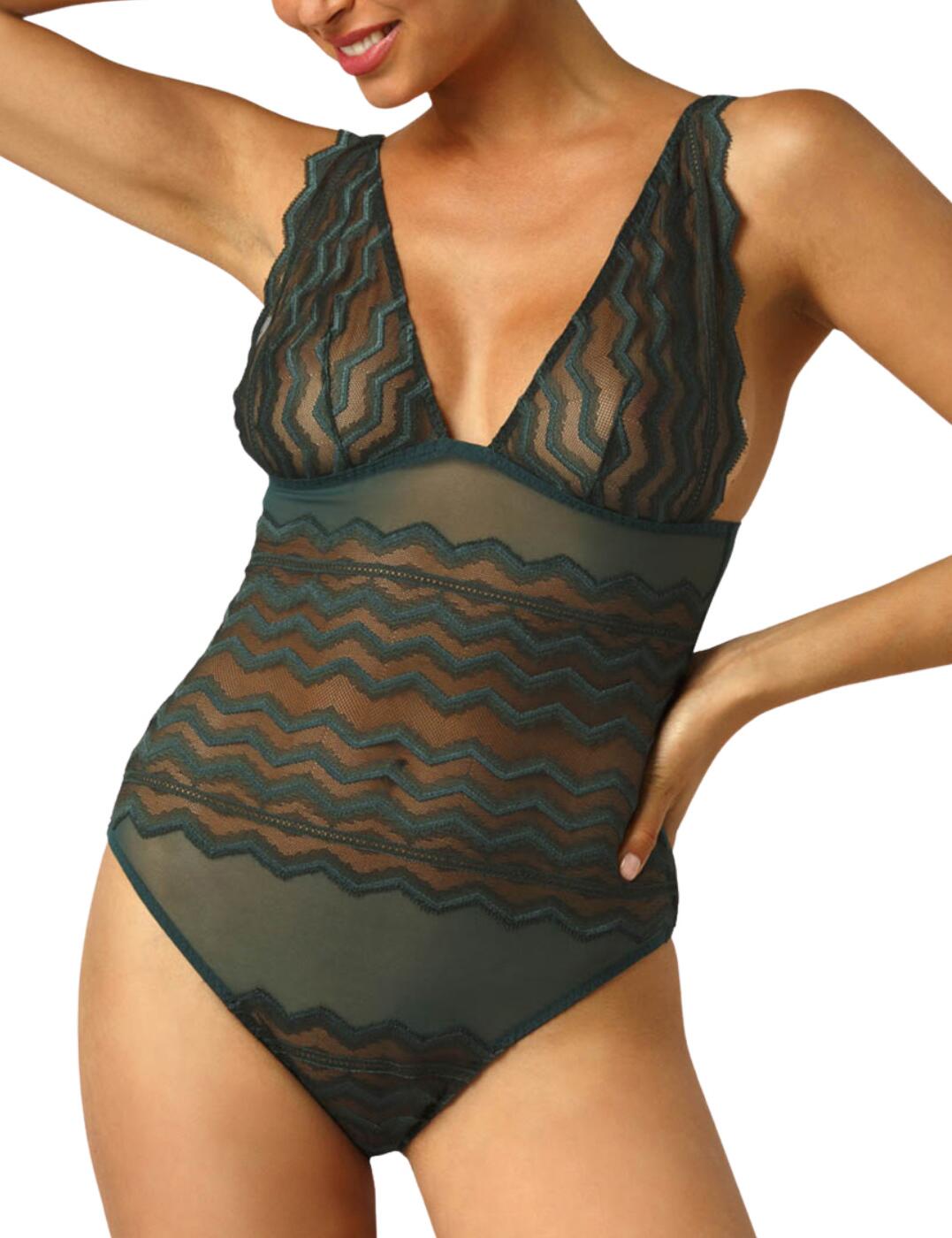 The Margot bodysuit from Muse by Coco De Mer features a plunging neckline which is perfect for accentuating your breasts and very flattering to the décolletage. This striking body features semi sheer mesh fabric with a contrasting opaque zig zag design in lace throughout. Wire free cups for a natural shape and feel. Adjustable straps and a swan fastening at the rear. Ultra thin straps and band with an open back showcase your back and feminine shape. The full rear is sheer offering moderate coverage. A flattering high leg cut perfectly highlights your hips.  Plunging neckline Ultra thin adjustable straps Swan hook fastening Full coverage rear Semi Sheer Composition: 95% Polyamide &pipe; 5% Elastane Listed in UK sizes  51373-92713-1228249 MAR-022-09  Bodysuit 