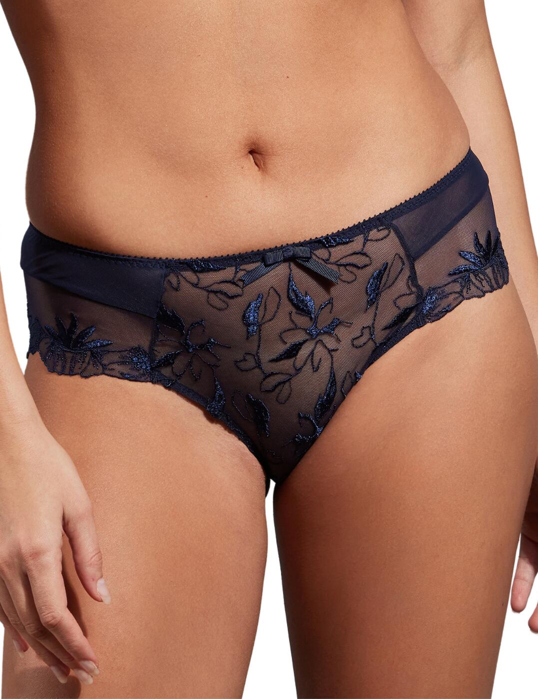 Welcome the Empreinte Anouk shorty brief, a breathtaking piece of lingerie that will leave you feeling utterly irresistible. Designed with the utmost attention to detail, this low rise waist brief is the epitome of elegance and sophistication, perfect for women who demand nothing less than luxurious lingerie. With its moderate rear coverage and sheer panelling, the Empreinte Anouk shorty brief strikes the perfect balance between sensual and refined. But what truly sets this piece apart is the exquisite embroidery that adorns the brief. The intricate pattern. Complete your look with the matching lingerie perfectly designed to complement this brief today.