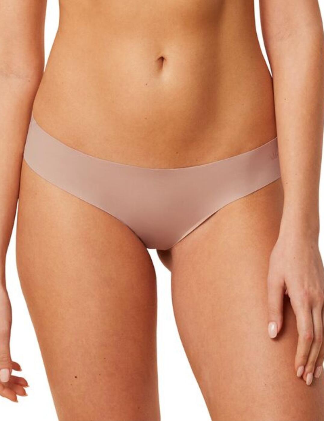 The Triumph Flex Smart Brazilian brief embodies the fusion of style and comfort, tailored for the modern woman who values a feminine and supportive undergarment. Its low-rise waist provides a contemporary fit that offers both comfort and elegance. The cheeky rear coverage strikes the perfect chord between playful and modest, inspiring confidence for any occasion. The cutting-edge thermoregulating fabric ensures optimal temperature control, keeping you cool when the mercury rises and warm during cooler days. Designed with seamless construction, these briefs offer the ultimate invisibility under clothing, eliminating concerns over visible panty lines. The high leg shape is constructed to flatter your curves, offering a sophisticated edge to this daily essential, while the smooth opaque fabric provides a silky feel and a sleek appearance.