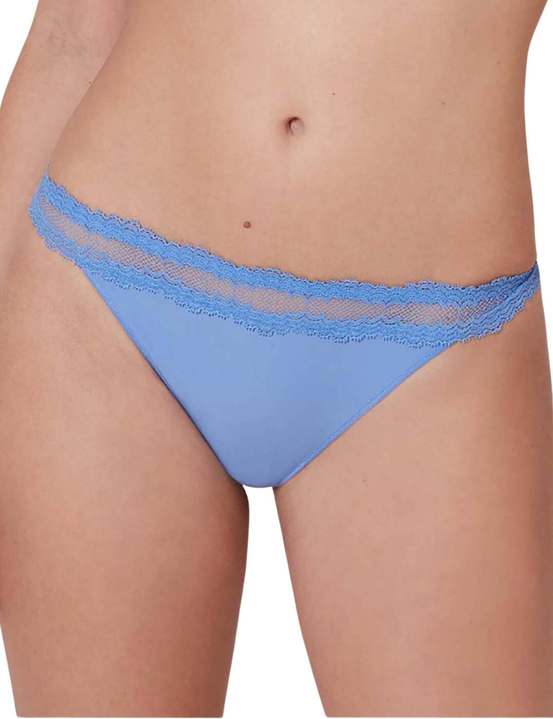 This feminine and discreet tanga brief from the Confiance range at Simone Perele is a perfect wear under any outfit. It is crafted from extremely soft mesh and tulle, giving a sensual wear. The front section offers great modesty with smooth opaque fabric. The waistband and rear are a semi-sheer lace, which really ups the femininity, whilst also adding a cheeky touch with the thong style rear.  Feminine and delicate design Semi-sheer lace waistband Opaque front section Minimal rear coverage Low rise waist Composition: 73% Polyamide &pipe; 16% Elastane &pipe; 11% Cotton Listed in UK sizes  51054-92209-1213636 12K710  (4) Tanga Brief