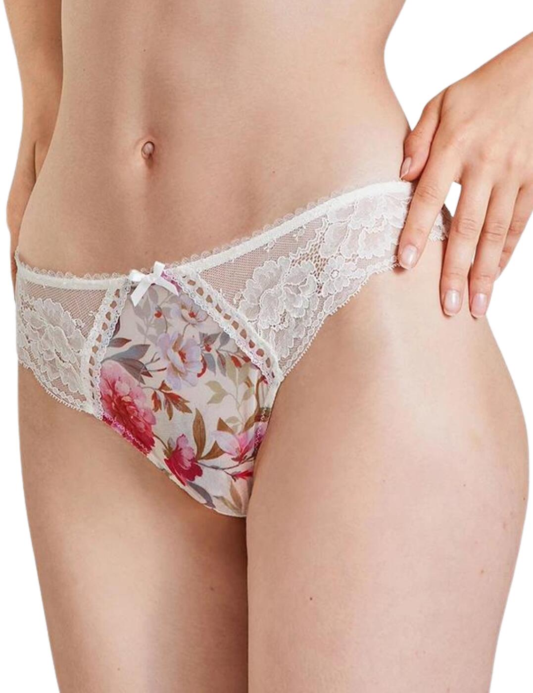 The tantalising tanga style has never looked so indulgent with this Magic Garden collection from Aubade. The cheeky minimal rear coverage is accentuated with the stunning Leavers lace on the back and sides, highlighting your curves in all the right ways. The gorgeous lace gives way to a colourful floral-patterned material on the front, with a cute satin bow in the centre finishing off the design. All those features combine to give you a luxurious option for a more sensual look, without sacrificing your elegant feminine style.  Seductive tanga style Gorgeous Leavers lace on the sides and back Smooth floral-patterned material on the front Minimal rear coverage Mid-rise waist Matching coordinates available Country of origin: Tunisia Composition: Lace: 74% Polyamide &pipe; 26% Elastane Composition: Gusset: 100% Cotton Composition: Tulle: 84% Polyester &pipe; 16% Elastane Listed in UK sizes  54937-97975-1273168 IA26 Tanga Brief