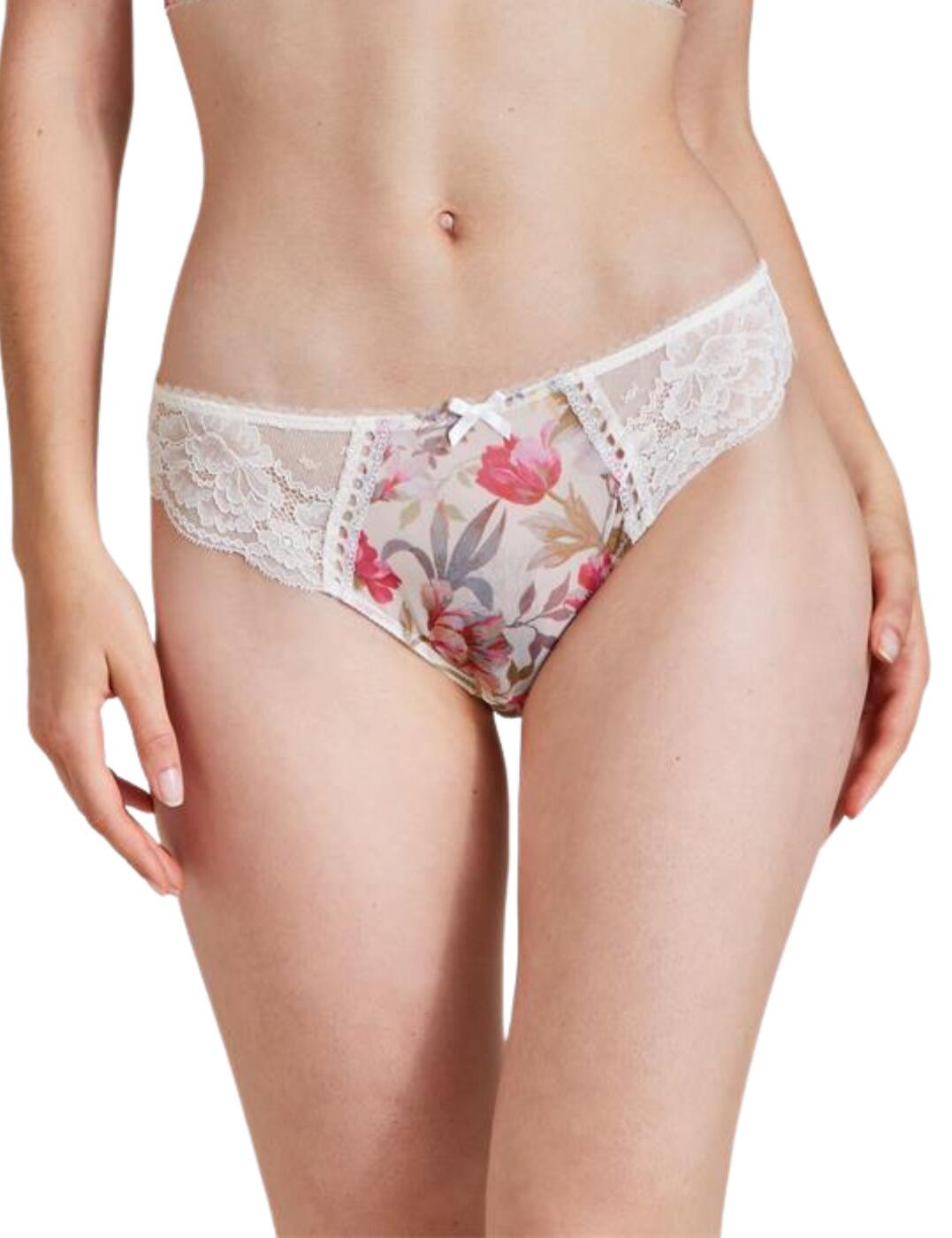 For stylish luxurious lingerie that can be worn on an everyday basis or to show off to a special someone, Aubade created the Magical Garden collection. These Italian briefs feature a comfortable mid-rise waist and full rear coverage making them an easy choice for your daily needs. However, the stunning sheer Leavers lace featured on the sides and back of these briefs, create an incredibly seductive vibe. To add a feminine touch, this piece has panels of smooth material on the front and back decorated with a colourful floral pattern.  Colourful floral-patterned panels on the front and back StunningLeavers lace on the sides and back Scalloped edges on the sides and back Mid-rise waist Full rear coverage Matching coordinates available Country of origin: Tunisia Composition: Lace: 74% Polyamide &pipe; 26% Elastane Composition: Gusset: 100% Cotton Composition: Tulle: 84% Polyester &pipe; 16% Elastane Listed in UK sizes  54938-97976-1271301 IA27 Italian Brief