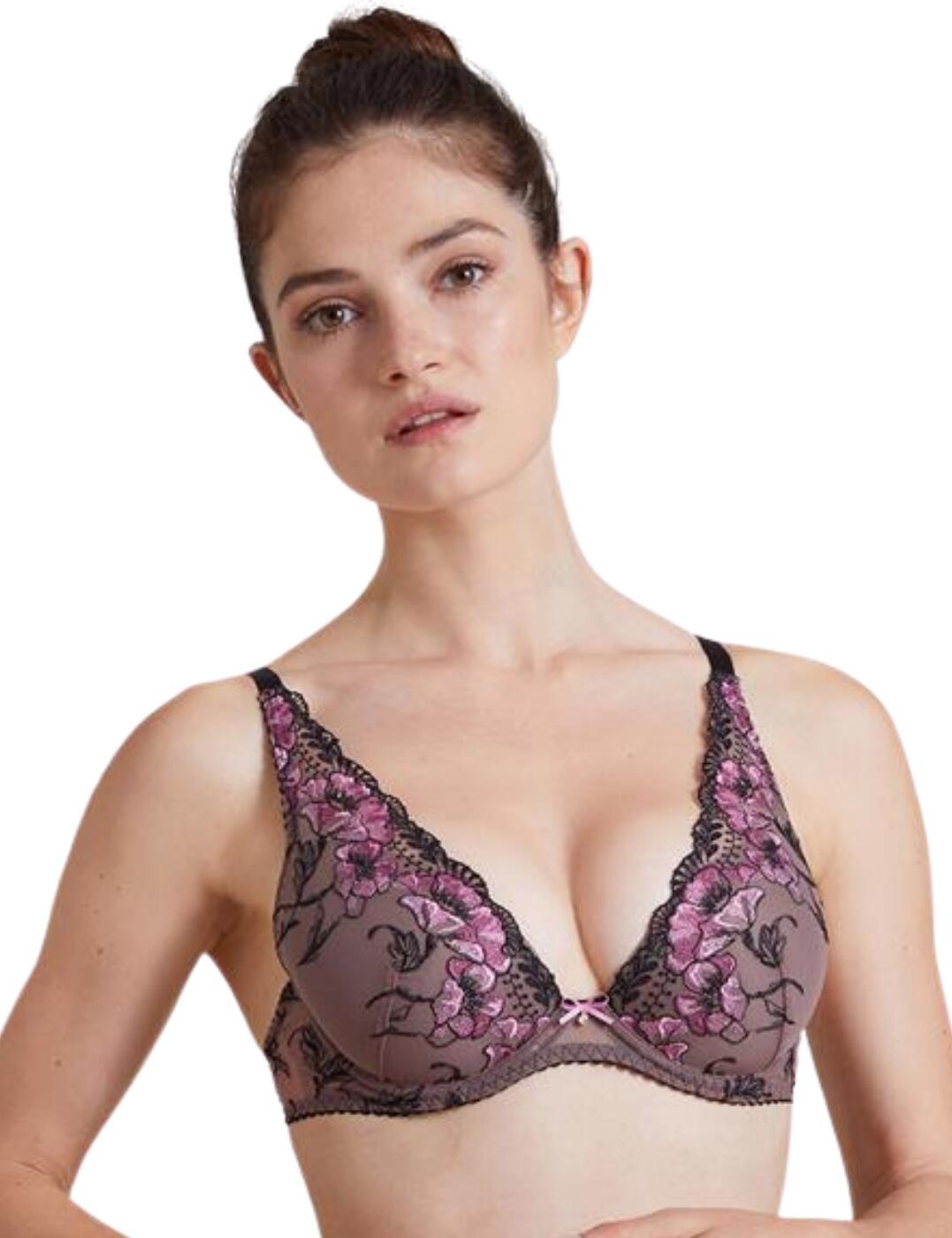 The A Fleur De Toi collection from Aubade delights with its stunning embroidery and unforgettable designs. This bra features a deep plunging neckline finished with triangle cups. The décolletage is enticingly embellished with the stunning A Fleur De Toi embroidery and scalloped edges, making sure that your curves are beautifully displayed. The semi-sheer material adds to the sensual look. The underwire provides support, while the adjustable shoulder straps, together with the hook and eye back closure, make sure that you can adapt this bra to your most comfortable fit.  Deep plunging neckline with triangle cups Stunning floral embroidery on the cups Semi-sheer materials Adjustable shoulder straps Hook and eye back closure Non-padded Underwired Matching coordinates available Country of origin: Tunisia Composition: Cup embroidery: 52% Polyester &pipe; 35% Polyamide &pipe; 13% Elastane Composition: Embroidery back: 55% Polyamide &pipe; 24% Polyester &pipe; 21% Elastane Composition: Lining: 100% Polyester Composition: Tulle: 80% Polyamide &pipe; 20% Elastane Listed in UK sizes  54945-98024-1272565 IBN81 Plunge Bra