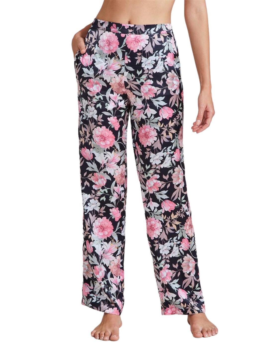Upgrade your everyday nightwear choices with this opulent Toi Mon Amour collection from Aubade. These trousers are the epitome of luxurious style. The bright floral pattern makes them stand out, while the luxurious silk material flows around your curves and feel simply amazing against your skin. The elasticated waistband and long length of this piece make it comfortable and easy to wear. Complement with other pieces from the luxurious Toi Mon Amour collection.  Eye-catching floral print Pocket on each side Elasticated waistband Long length Matching coordinates available Country of origin: China Composition: Fabric - 100% Silk Composition: Lace - 100% Polyamide Composition: Seat - 100% Cotton Listed in UK sizes  55088-98204-1272513 QS60-1 Trousers