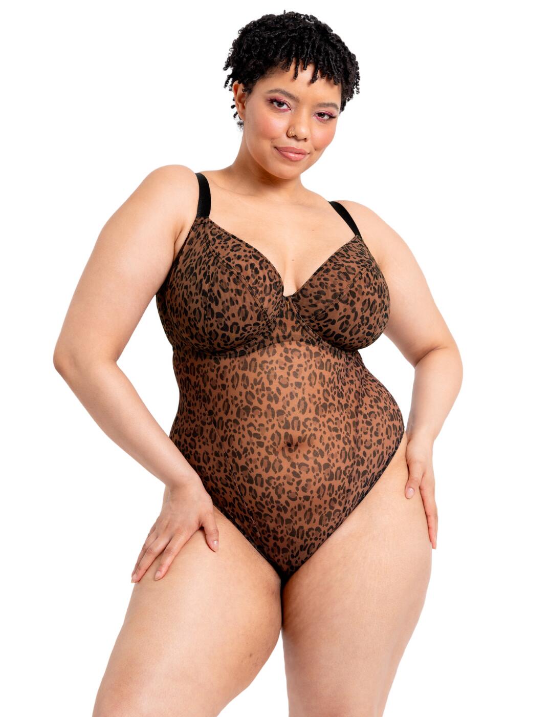 Step into the perfect combination of style and sustainability with the Cool Cat plunge bodysuit by Curvy Kate. A bodysuit that embraces your curves with a confident hold, giving you an alluring plunge without the unnecessary padding. Indulge in second-skin comfort with a stretch-fit design that hugs your body in all the right places. Reinvent your look with versatility at your fingertips with multi-way straps that offer the freedom to tailor your bodysuit to any outfit, occasion, or mood. Feel good inside and out knowing your bodysuit is crafted from recycled materials. The Cool Cat plunge bodysuit isn't just any addition to your wardrobe - it's a statement. Why just walk when you can strut with confidence?