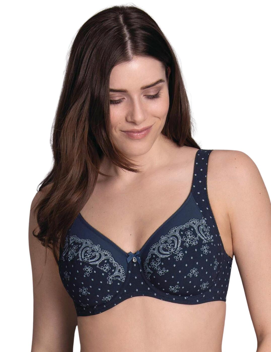 Add some luxury to your lingerie collection with this beautiful Belvedere underwired comfort bra by Anita. Not only is it beautiful it is also highly functional, it has two-part cups which along with the underwire shapes the bust into a gorgeous flattering shape. It has padded straps, providing support and comfort as well as additional support from the power tulle mesh-lined back. The bra has a polka dot design with a swirly pattern on the cups, it also has a cute centre bow that is decorated with a pendant. Adjustable straps along with a hook and eye closure to the rear allow for a custom fit.  Underwired bra Comfortable fit Two-part cups Creates beautiful shape Padded adjustable straps Power tulle mesh-lined back which provides support Polka dot design with swirly detailing Cute centre bow with pendant Hook and eye closure at the rear Composition: 82% Nylon &pipe; 18% Elastane Listed in UK sizes  51256-92508-1215341 5886 Underwire Comfort Bra