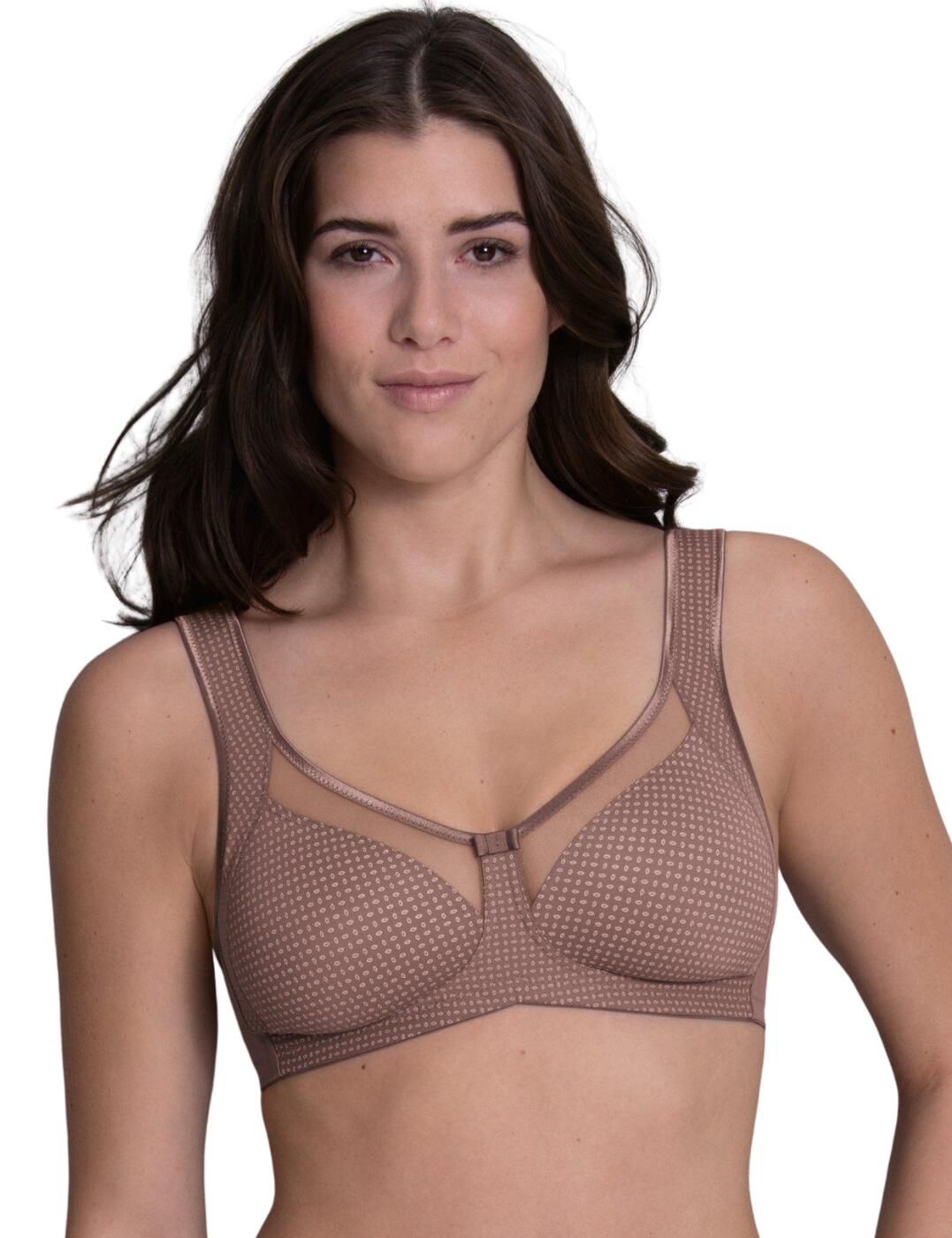 The Clara Art by Anita introduces elegant and simple pieces including this comfort bra. This bra has pre-shaped moulded cups and is non-wired for comfort. It is made from a lightweight fabric that is combined with fine print. The bra has semi-transparent panels along the cleavage creating a lightweight look. The straps have shoulder padding to ensure additional comfort and are also adjustable. It has a hook and eye closure to the rear for an individual fit. To the centre of the bra, there is a cute bow adding a feminine feel.  Comfort bra Elegant and simple Pre-shaped moulded cups Non-wired Stretch fabric with combined knit fabric Semi-transparent voile panel over cleavage Shoulder padding on adjustable straps Comfortable fit Hook and eye closure Centre cute bow Feminine feel Composition: 82% Nylon &pipe; 18% Elastane Listed in UK sizes  51257-92517-1216664 5865  Comfort Bra