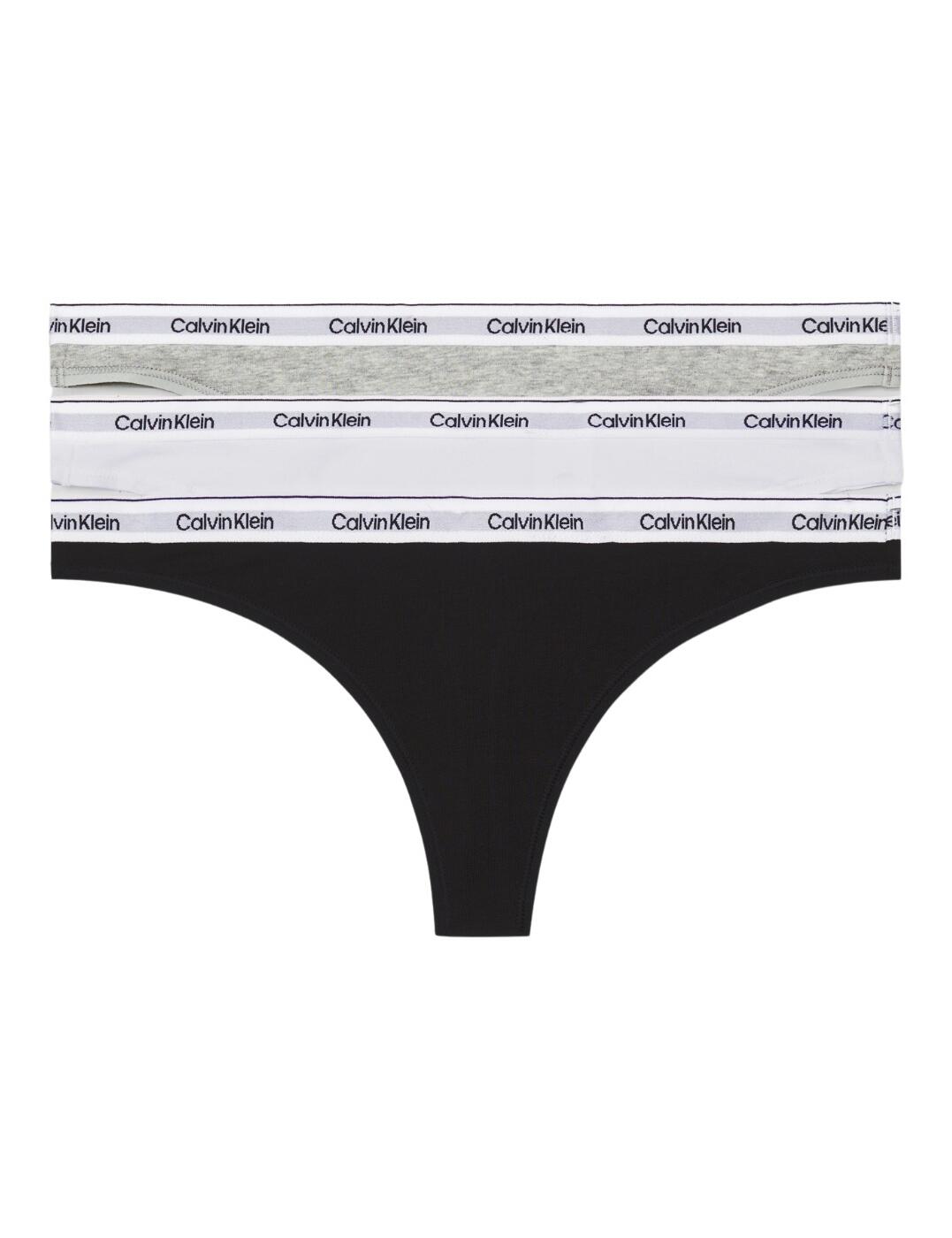 Ladies, say hello to your new must-have lingerie essential - the Calvin Klein Modern Logo thong 3 pack. This 3-pack includes low-rise thongs that offer minimal rear coverage, making them ideal for everyday wear. The low-rise waistband sits perfectly on your hips, giving you a seamless silhouette under any outfit. And let's talk about the iconic Calvin Klein waistband - it's the signature touch that adds a touch of luxury to this lingerie set. Not only are these thongs functional, but they also come in a variety of colours to suit your every mood. And let's not forget about the fabric - a plain opaque soft fabric that feels like a second skin, making you forget you're even wearing them. So go ahead, treat yourself and feel confident and fabulous from the inside out.