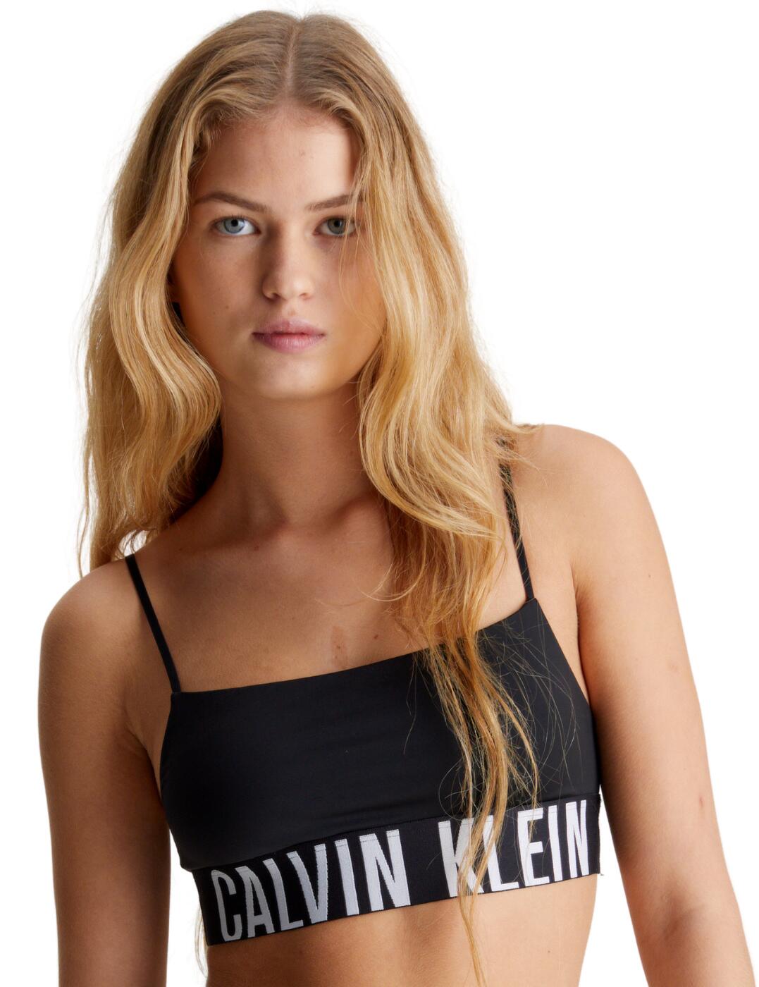 Presenting the Calvin Klein Intense Power timeless bralette - the perfect fusion of fashion and function. This bralette offers unparalleled comfort and support with its unlined, wire-free design and adjustable straps, all while maintaining a sleek, stylish look. Featuring iconic Calvin Klein branding, it's designed for the modern woman who doesn't want to compromise on style or comfort. Ideal for everyday wear and easily paired with matching pieces, it represents effortless style and confidence. Elevate your lingerie collection with this must-have statement piece.