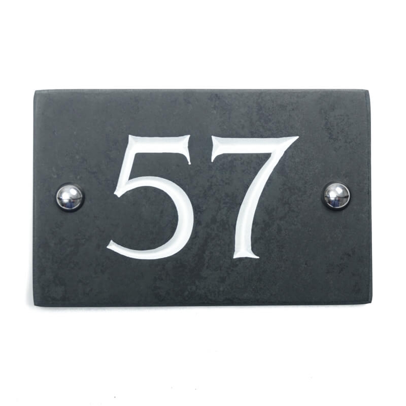 Slate house number 57 v-carved with white infill numbers