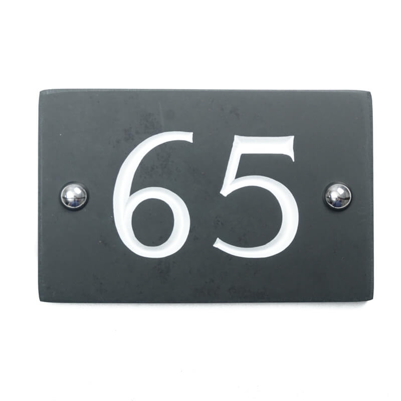 Slate house number 65 v-carved with white infill numbers