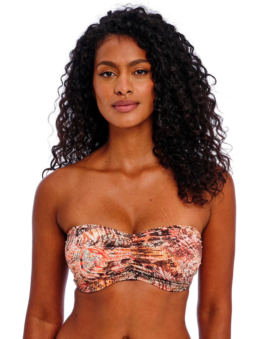 Embrace your animal side with the Desert Cat collection bandeau bikini top by Freya. This underwired bikini top accentuates your natural shape with flattering fabric gathers at the bust and non-padded, lined cups for support. Experience a fully custom fit with detachable, adjustable shoulder straps, plastic clasp closure, and a removable neck tie with scallop shell detailing for a touch of beachside glamour. This bold and playful print is sure to turn heads this holiday season - especially when paired with matching bikini bottoms, also available.
