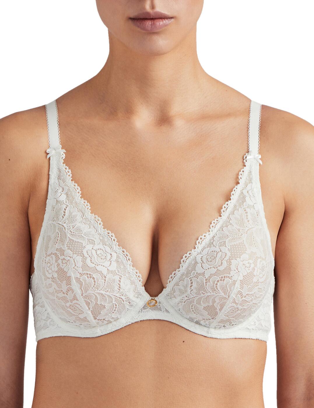 Aubades recognisable seductive designs are combined with a romantic sophisticated style in the Rosessence collection. The range focuses on classic designs which offer comfort blended with all-over floral stretch lace for a luxury feminine feel. This plunging triangle bra has scalloped edging which follows your curves and the deep neck neckline creates an extremely sexy cleavage. Adjustable straps offer an individual fit and the underwiring creates support. Complete your look with matching items available from the Rosessence range by Aubade.  Feminine complete lace design Seductive plunging neckline Crystal charm Underwiring adds support Adjustable straps for a unique fit Composition: 89% Polyester &pipe; 11% Elastane Listed in UK sizes  48639-107393-1423921 HK12 Triangle Bra