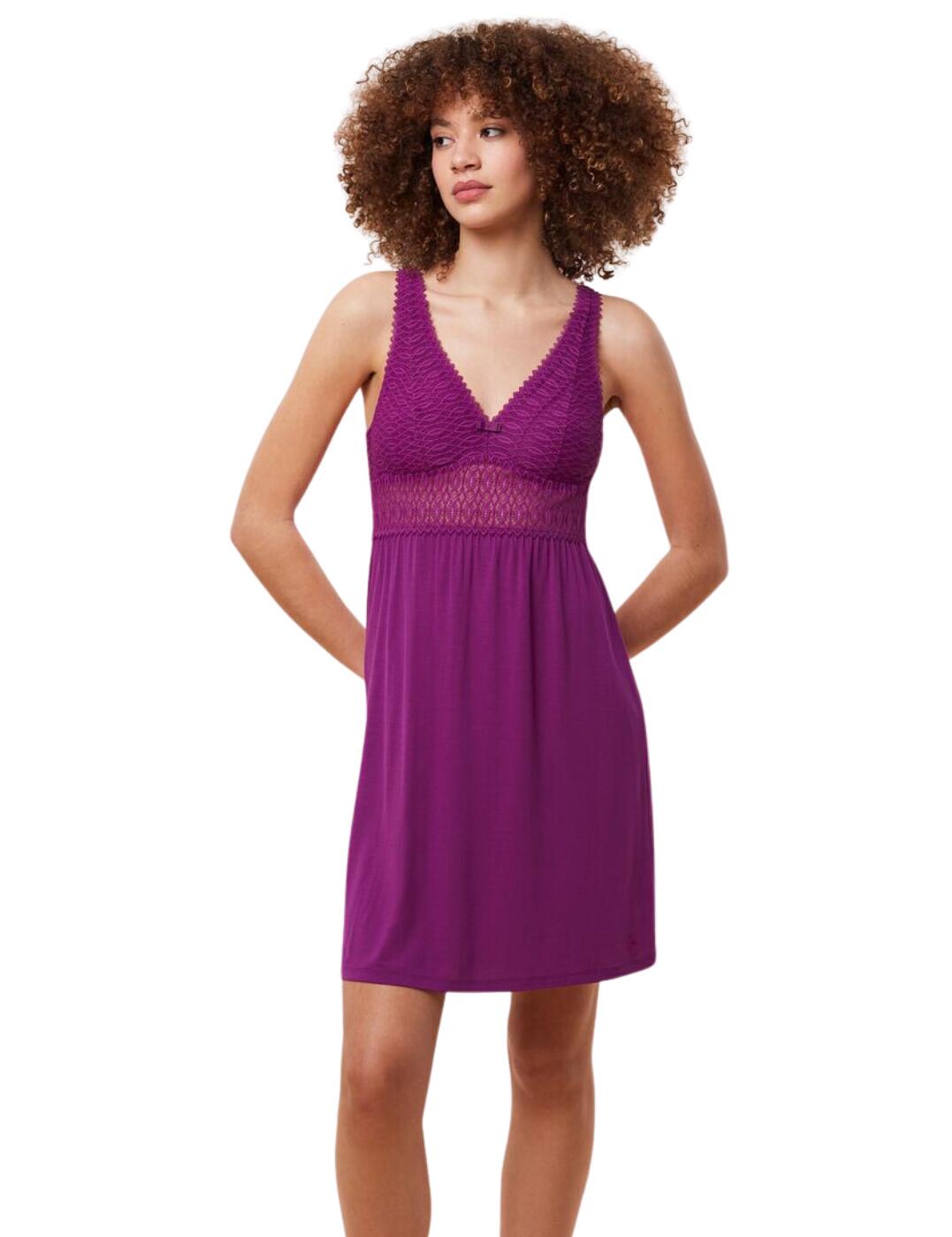 Sleep comfortably in style with the Triumph Aura Spotlight one-piece nightie! This cute night dress will become your go-to for sleepwear. The pretty, lace-covered cups and plunging neckline provide a glimpse of femininity while the adjustable shoulder straps make sure you get the perfect fit. It's non-wired so it won't cause any irritation as you twist and turn throughout the night, as well as being non-padded for a natural fit. Plus, this dress is made from soft fabrics which make it easy to sleep in. And it ends before the knees, making sure you don’t overheat under those blankets!  Comfortable nightdress Pretty lace-covered cups Plunging neckline Non-wired for comfort Non-padded for a natural fit Soft fabric easy to sleep in Adjustable shoulder straps Ends before the knee Country of origin: Cambodia Composition: 95% Modal &pipe; 5% Elastane Listed in UK sizes  61325-106364-1414919 10216543 Nightwear