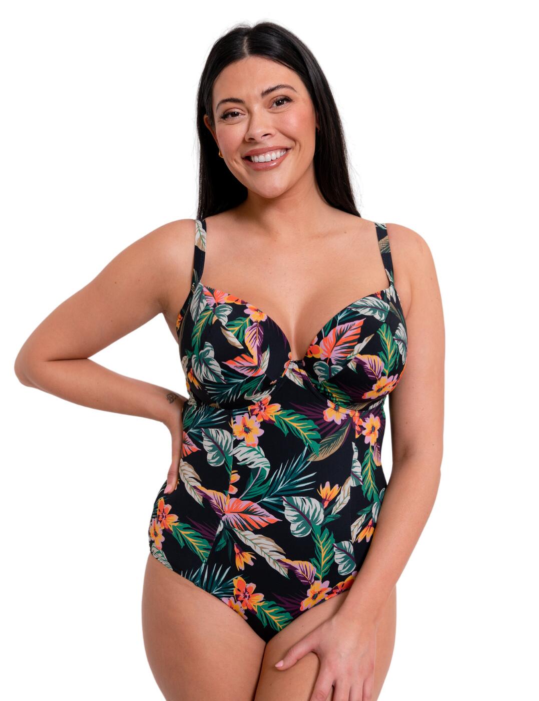 Get ready to make a splash with the Curvy Kate Cuba Libre padded plunge swimsuit! The bold tropical print is a fashion-forward choice, combined with the plunging neckline for a fun and flirty exotic vibe that is effortless. The padded cups and underwiring offer plenty of support, and the adjustable multiway straps make this an excellent choice for those wanting both style and comfort! Plus, you'll feel as secure as can be in the full rear coverage. The whole Cuba Libre range is made from durable, recycled materials, making this a more environmentally friendly choice too!  Stylish padded plunge swimsuit Vibrant tropical floral print Plunging neckline Underwired for additional support Padded cups for support Full rear coverage Made from recycled materials Country of origin: China Composition: Listed in UK sizes  61346-106390-1406096 CS032601 Swimsuit
